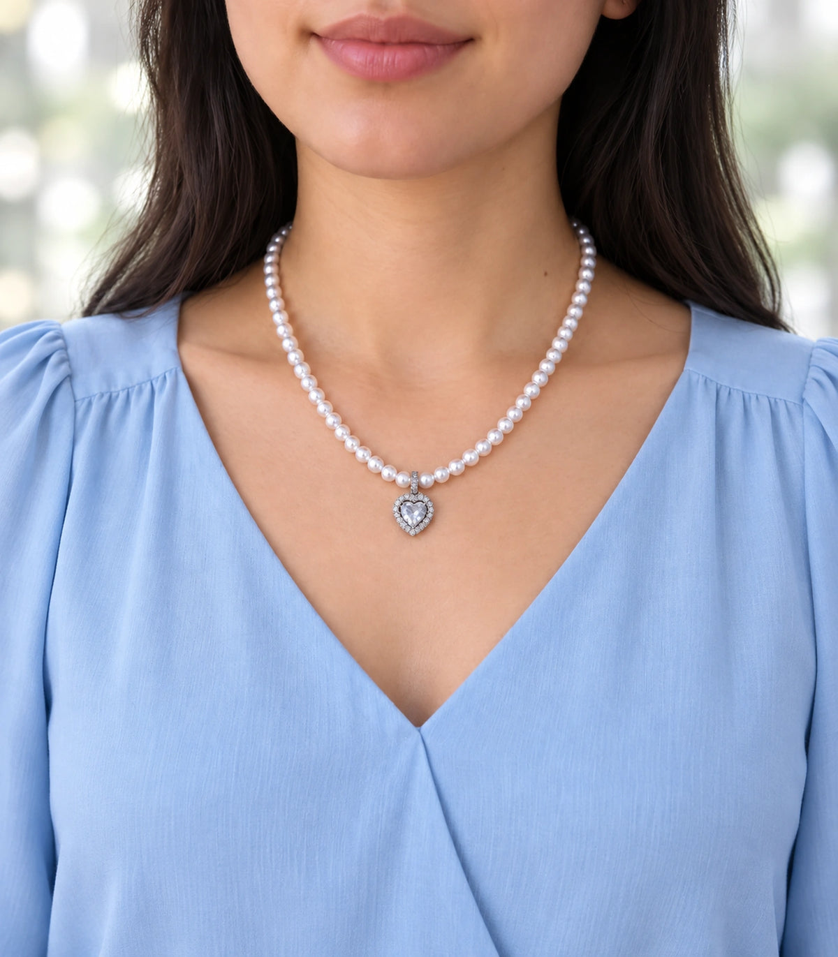 JIMIKI Silver Tone Heart Halo Crystal Pearl Style Necklace in Silver / White, model wearing view