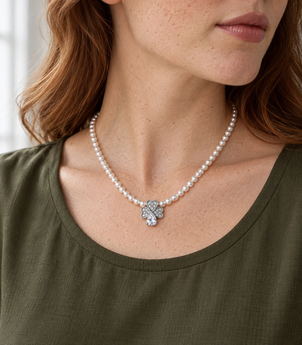 JIMIKI Silver Tone Heart Petal Crystal Drop Pearl Necklace in Silver / White, editorial model view