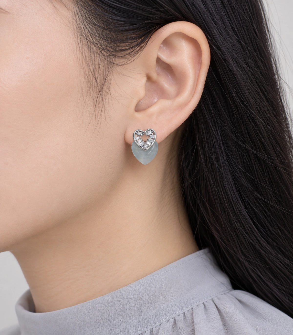 JIMIKI Silver-Tone Layered Crystal Grey Heart Stud Earring Pair in Silver Tone, model wearing view