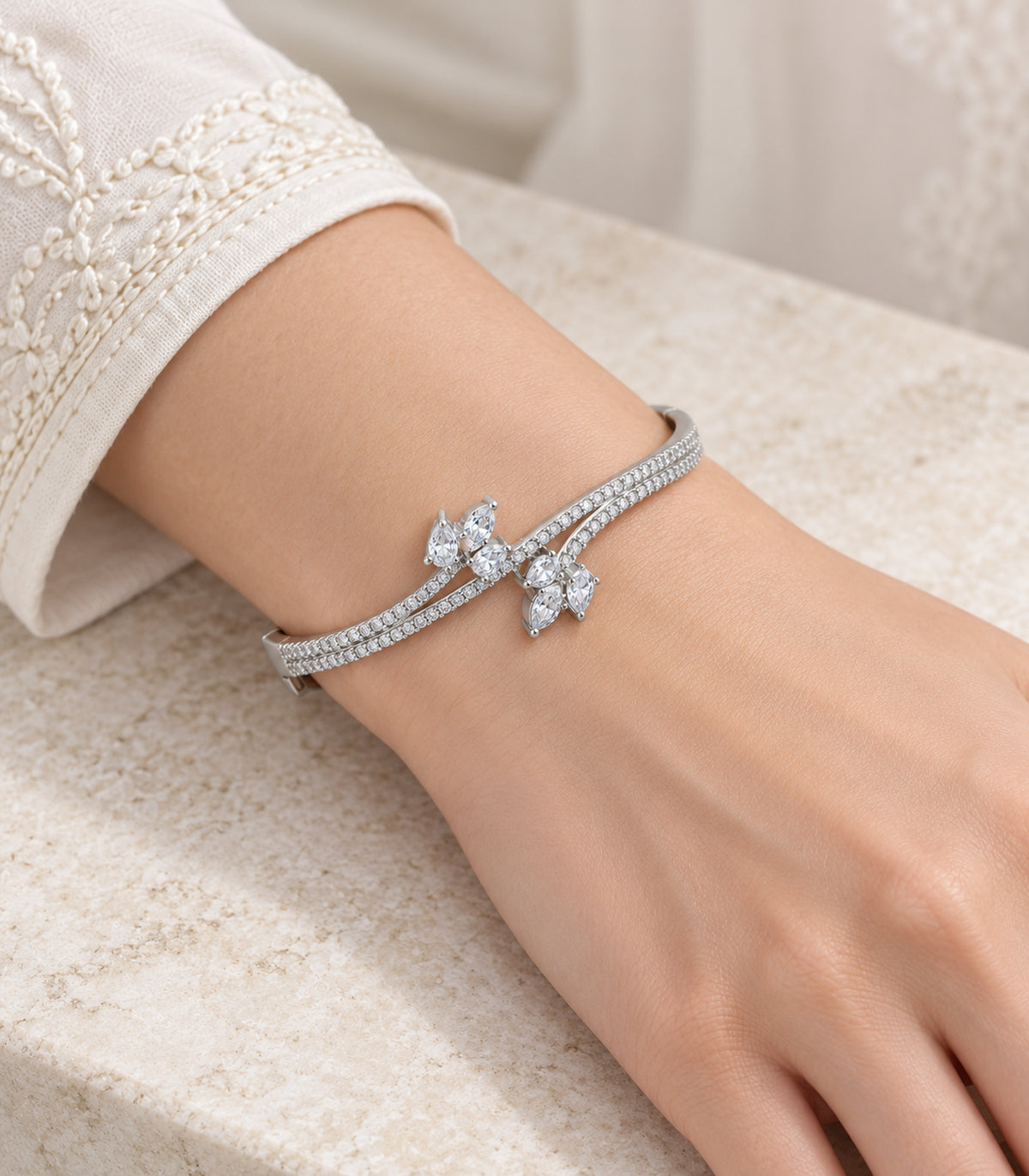 Silver-tone marquise cluster crossover bangle, model view