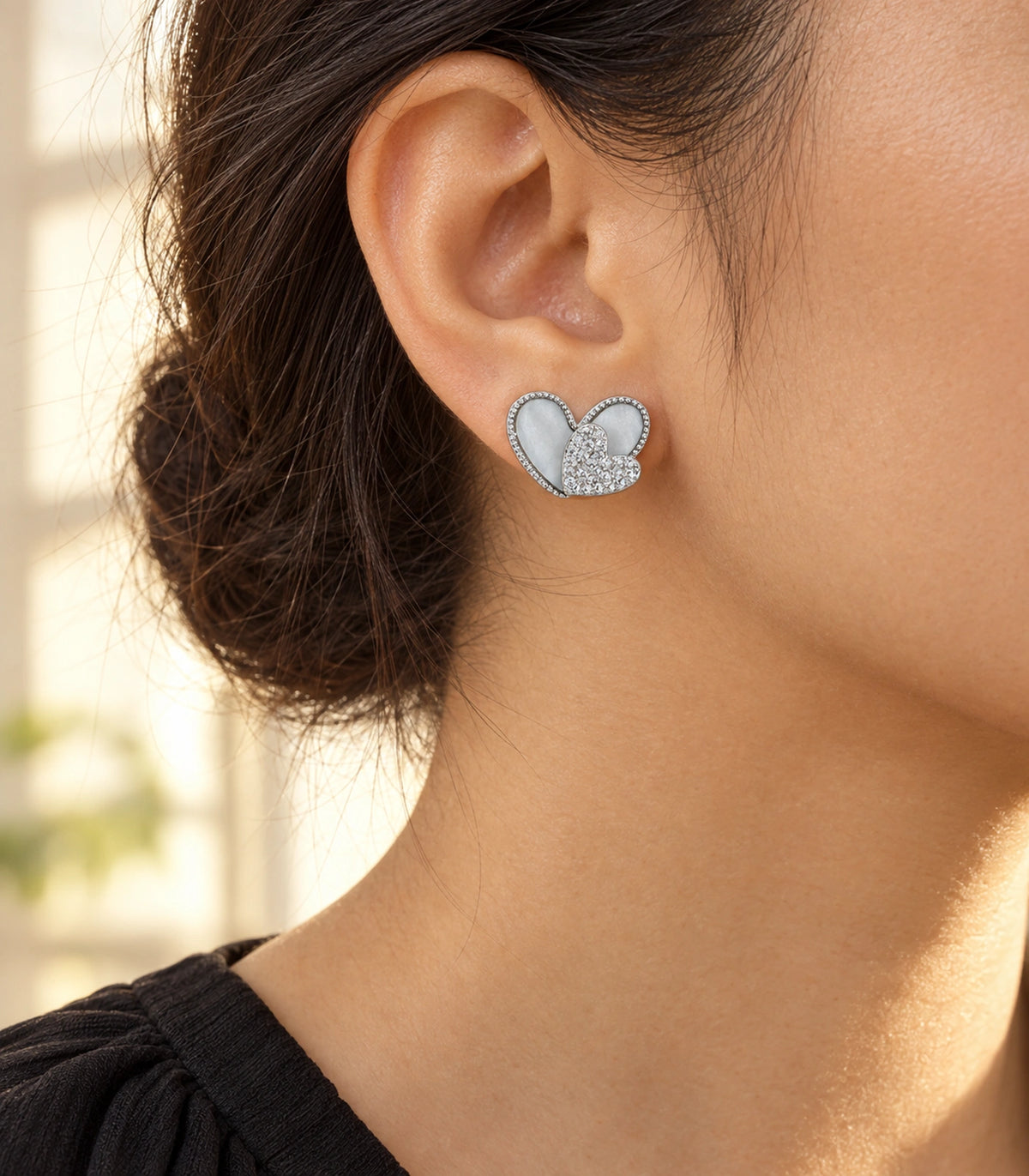 JIMIKI Open Heart Pave Heart Stud Earring Pair in Silver tone, editorial model view #color_silver tone