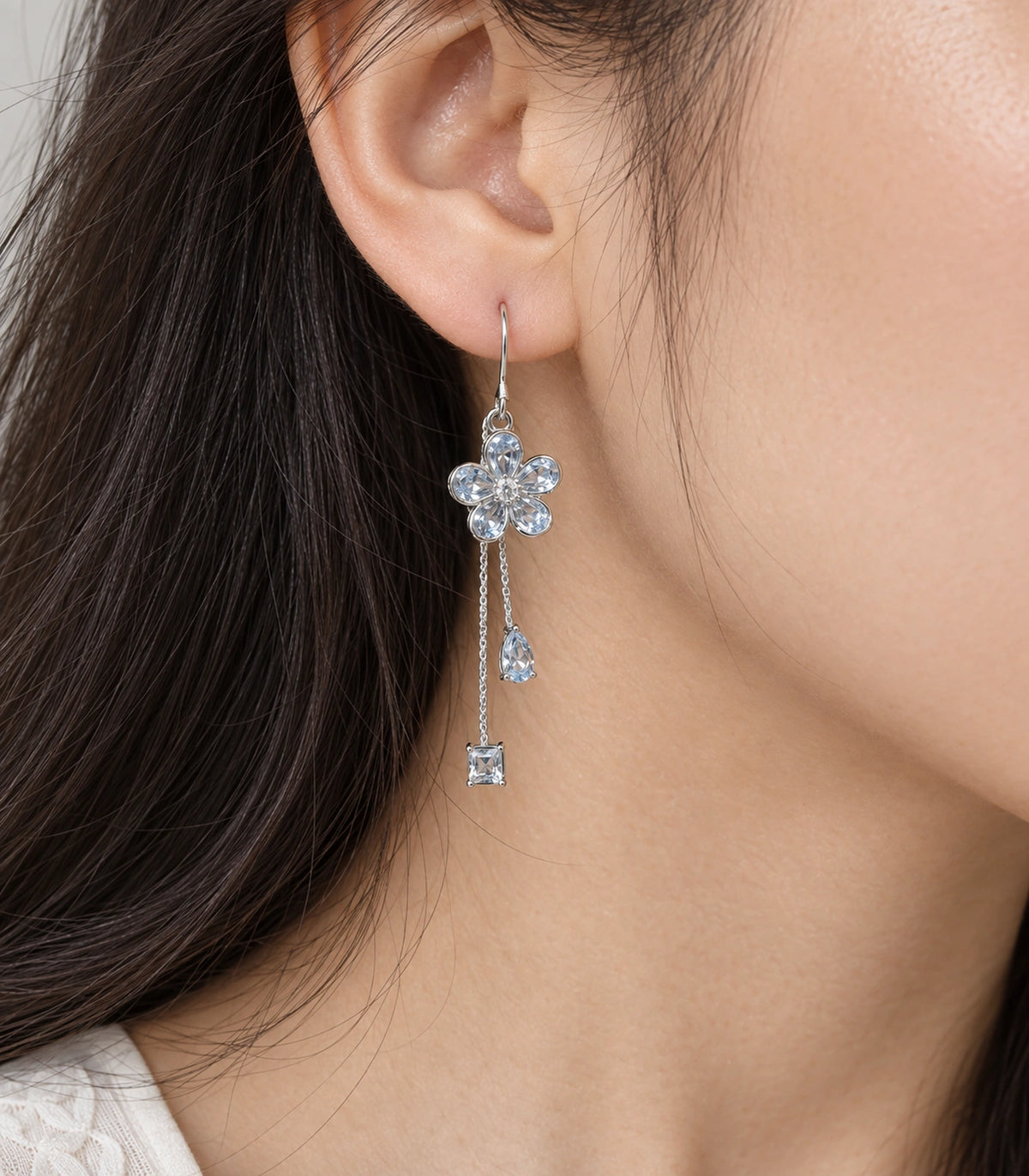 JIMIKI Silver Tone Pale Blue Flower Pear Square Chain Earring Pair in Silver-tone, close-up detail