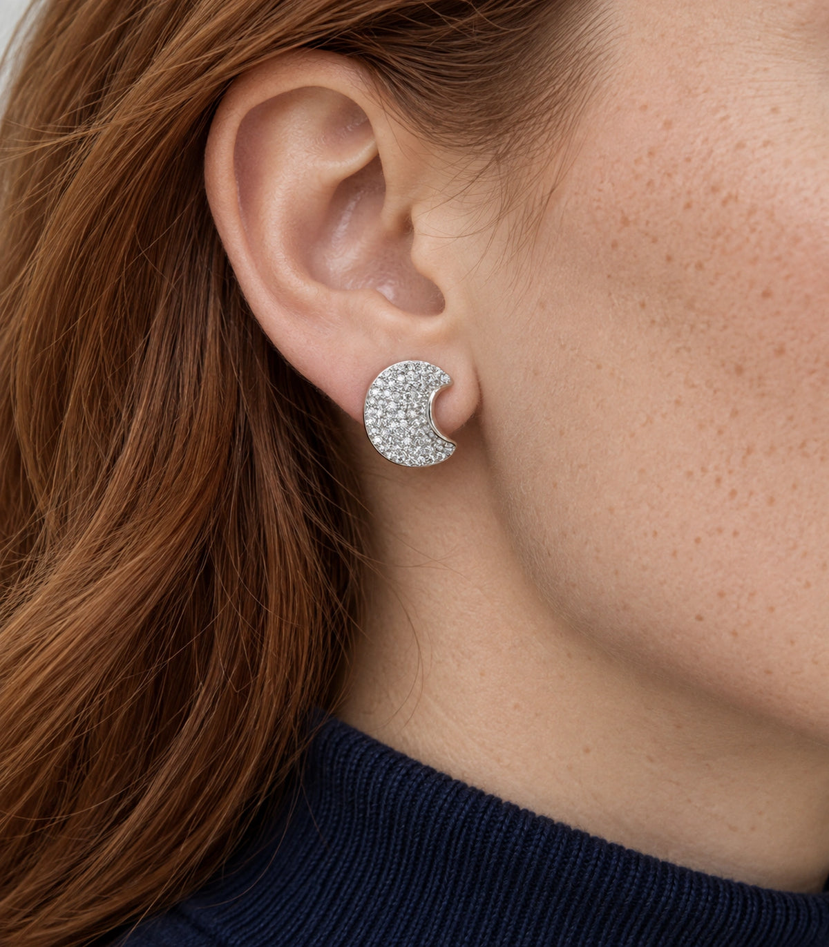 JIMIKI Pave Crescent Moon Stud Earring Pair in Silver-tone, model wearing view #color_silver-tone