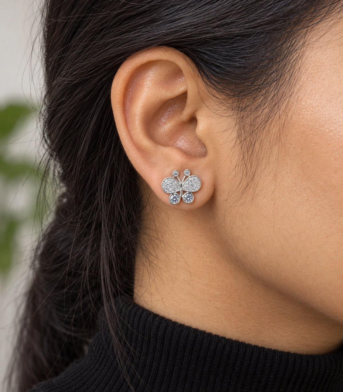 JIMIKI Silver-Tone Pave Crystal Butterfly Stud Earrings in Silver Tone, model wearing view