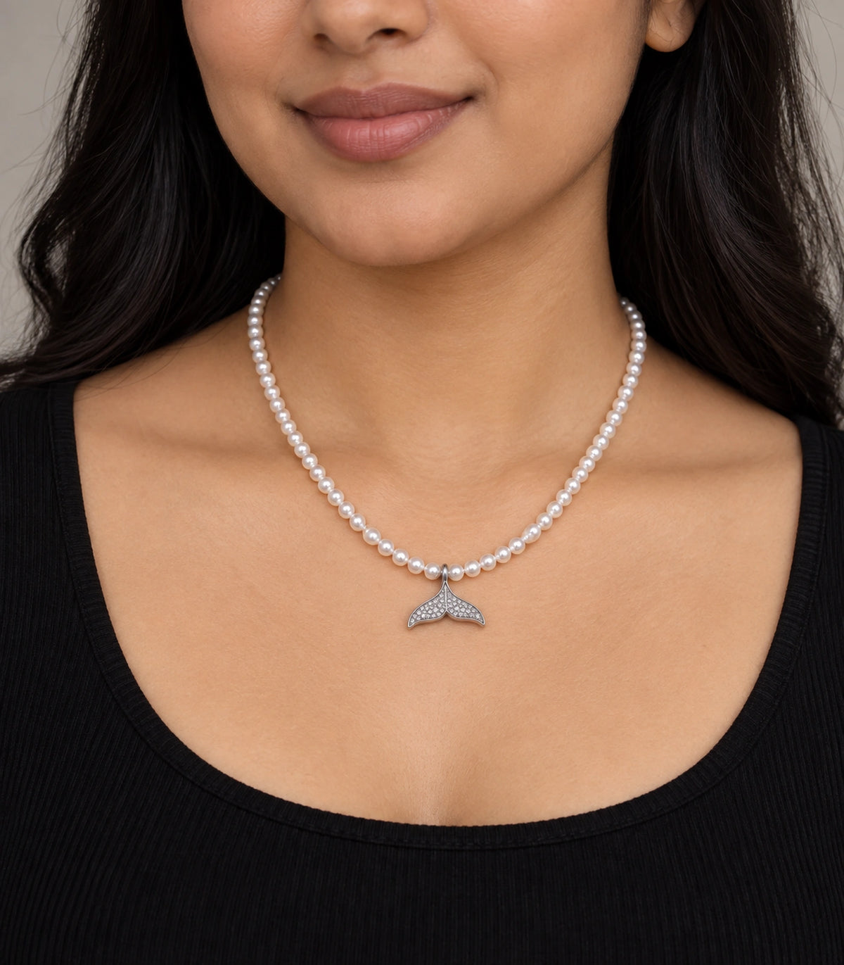 JIMIKI Pavé Whale Tail Pearl Necklace in Silver-tone, worn with a simple outfit #color_silver-tone
