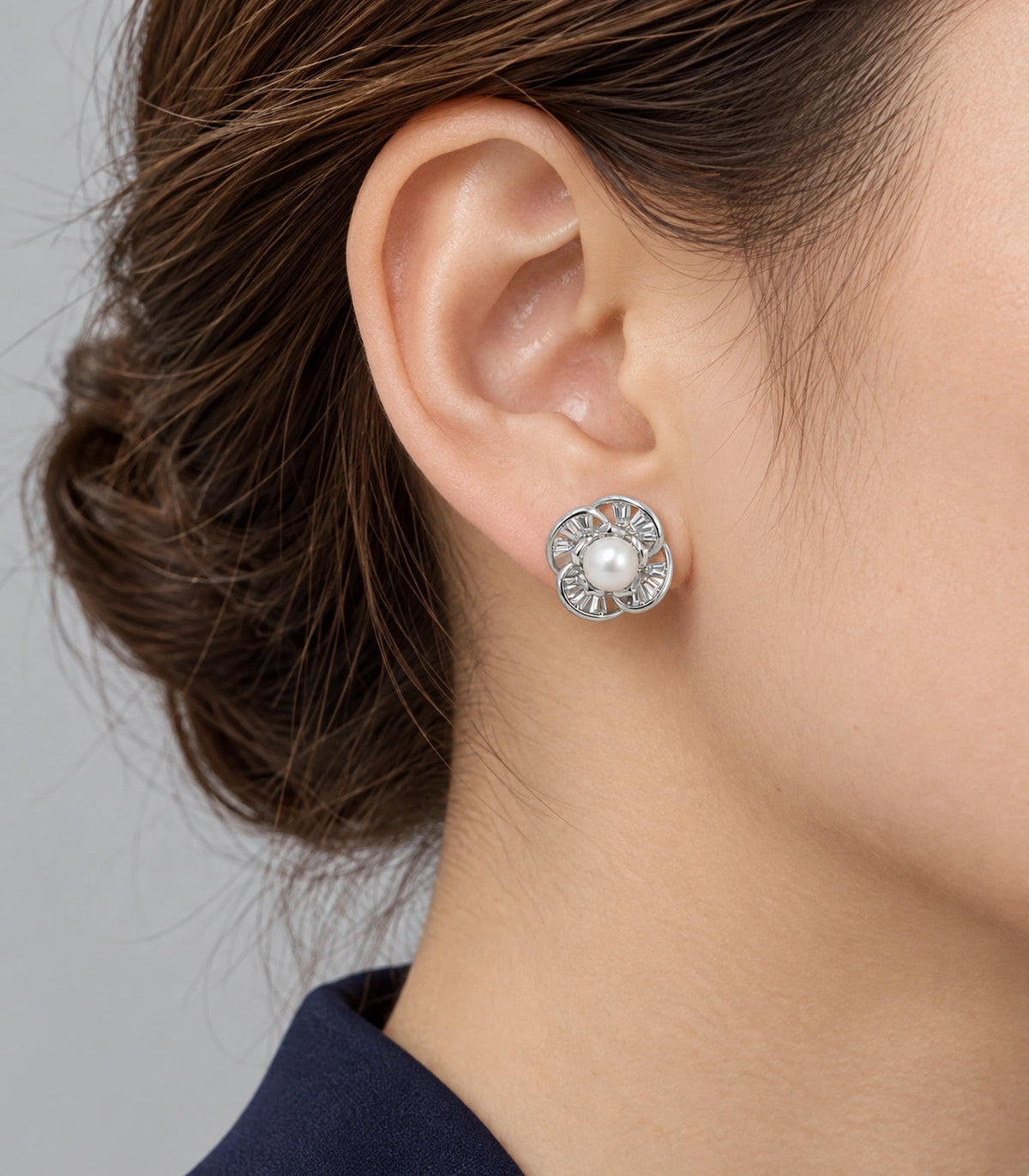 JIMIKI Pearl Centre Crystal Flower Stud Earring Pair in Silver Tone, editorial model view #color_silver tone