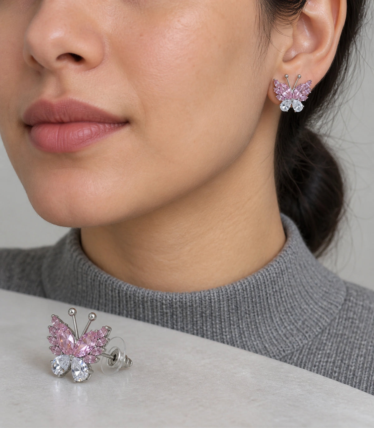 JIMIKI Marquise Teardrop Butterfly Stud Earring Pair in Silver tone / Pink, model wearing view #color_silver tone / pink