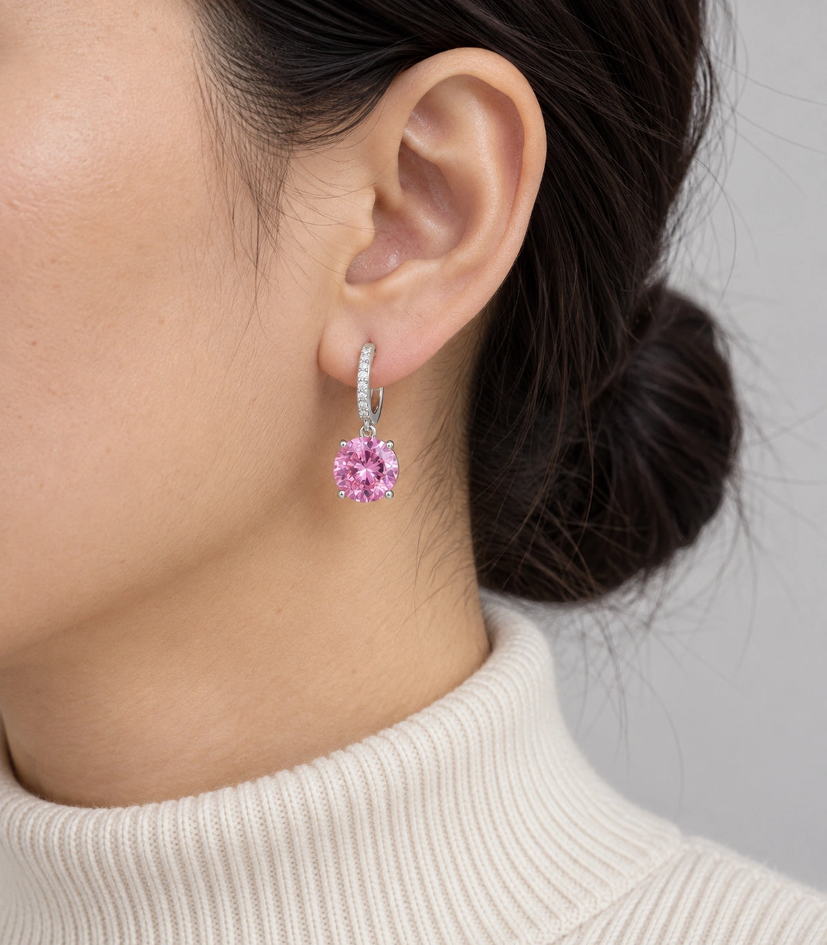 JIMIKI Round Crystal Hoop Drop Earring Pair in Silver tone / pink, model wearing view #color_silver tone / pink