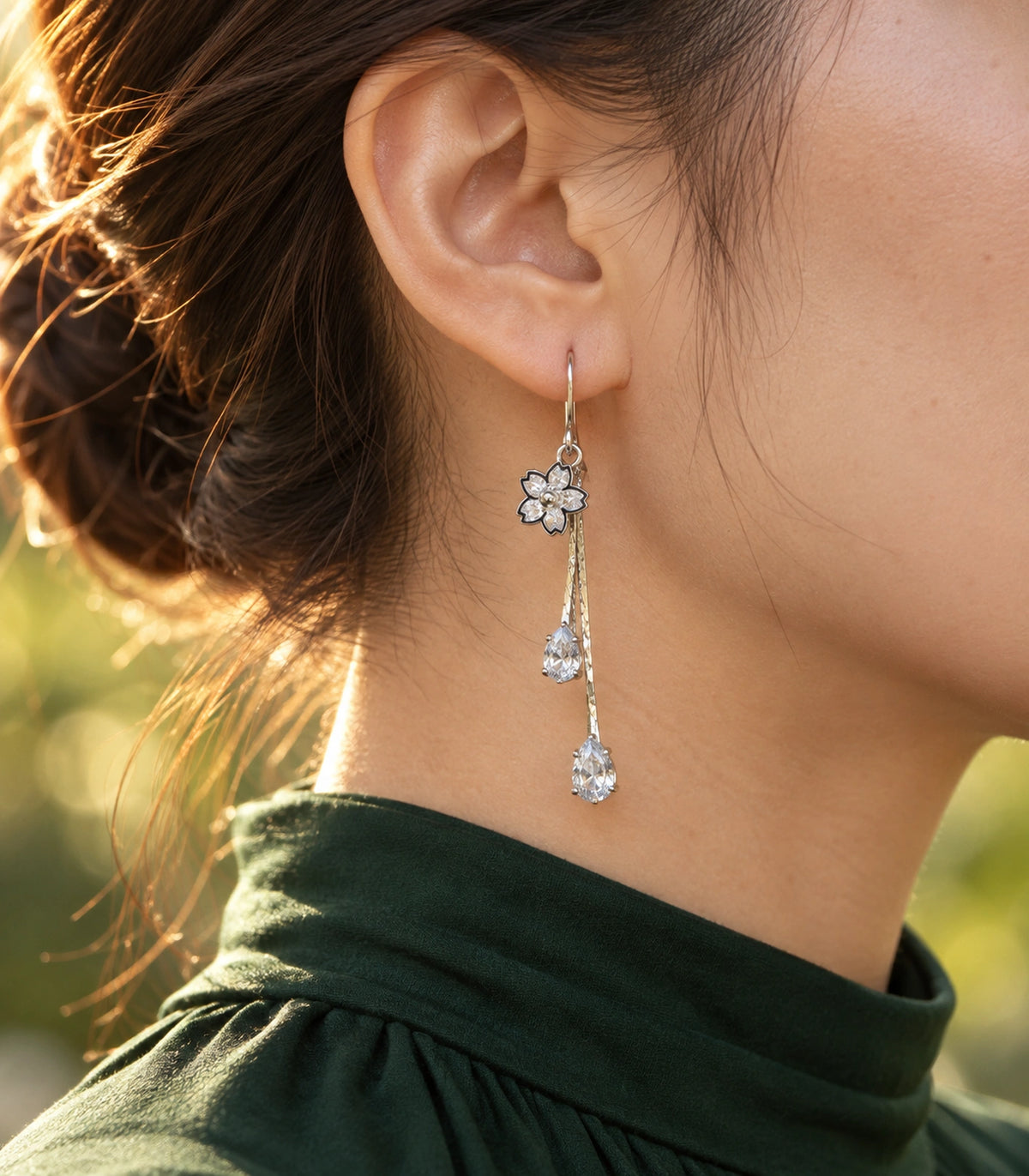 JIMIKI Silver Tone Pointed Flower Twin Pear Chain Earring Pair in Silver-tone, editorial model view