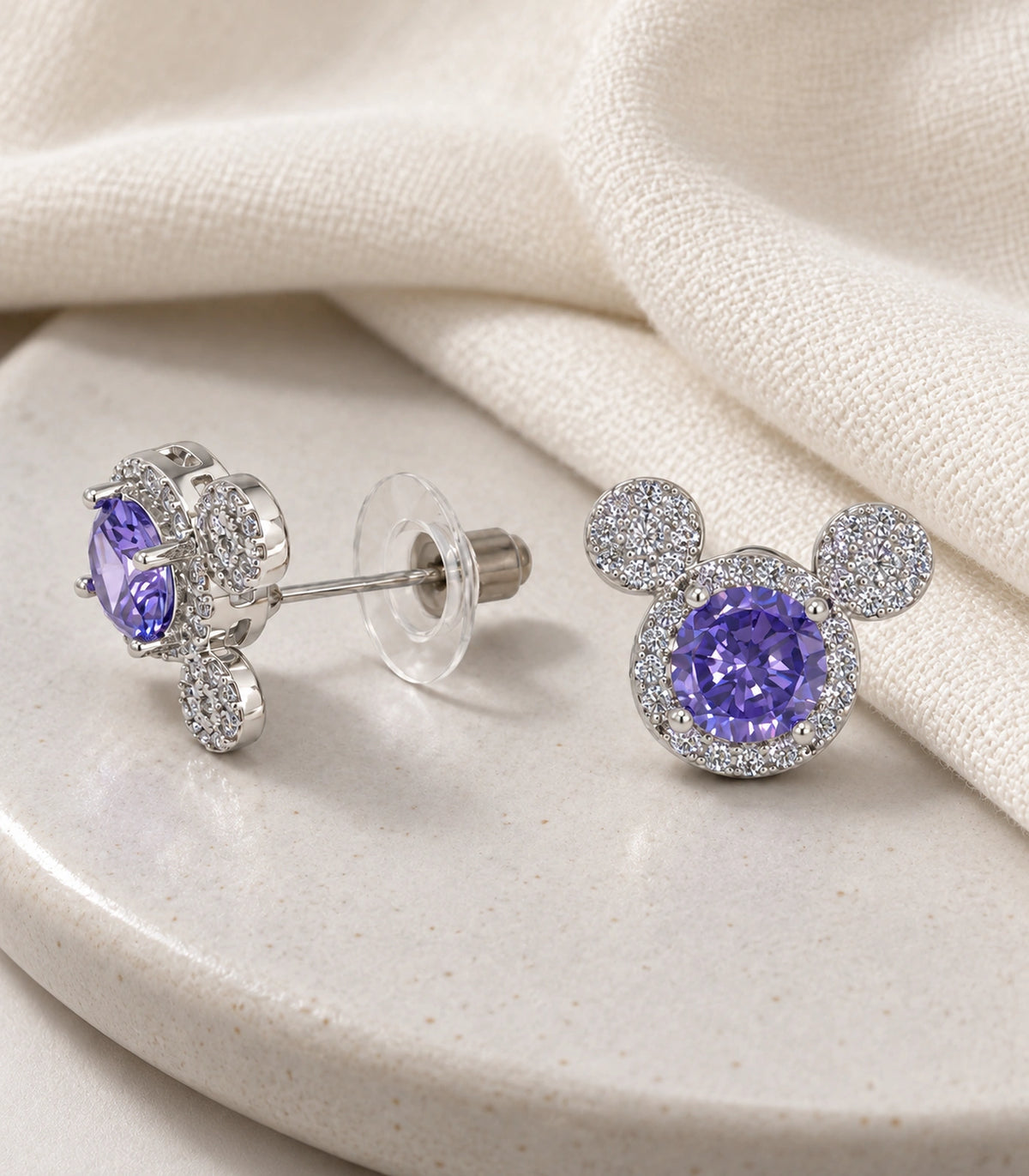 JIMIKI Crystal Three Circle Stud Earring Pair in Silver tone / purple, editorial flat lay #color_silver tone / purple