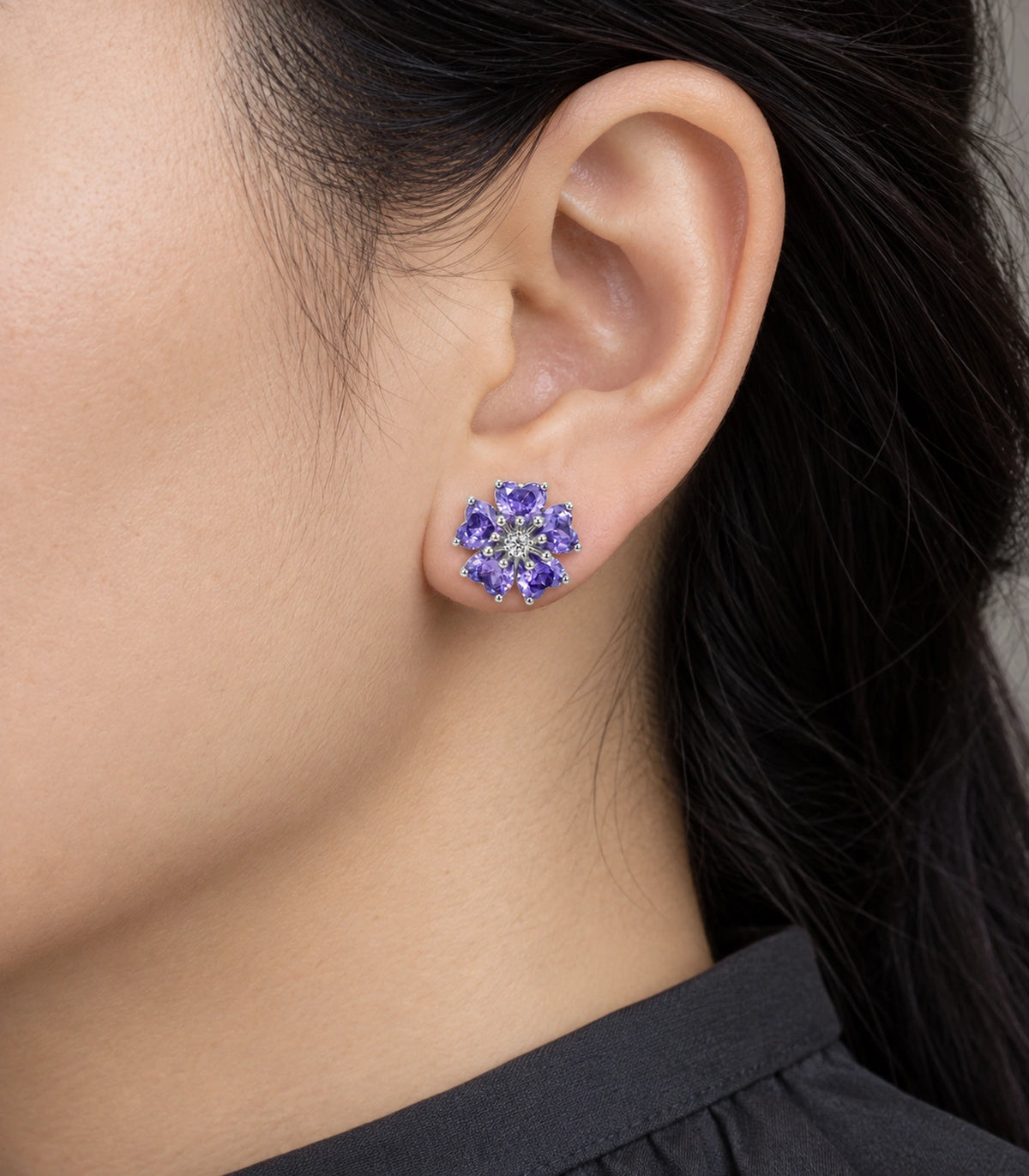 JIMIKI Five Petal Crystal Flower Stud Earring Pair in Silver tone / purple, close-up detail #color_silver tone / purple