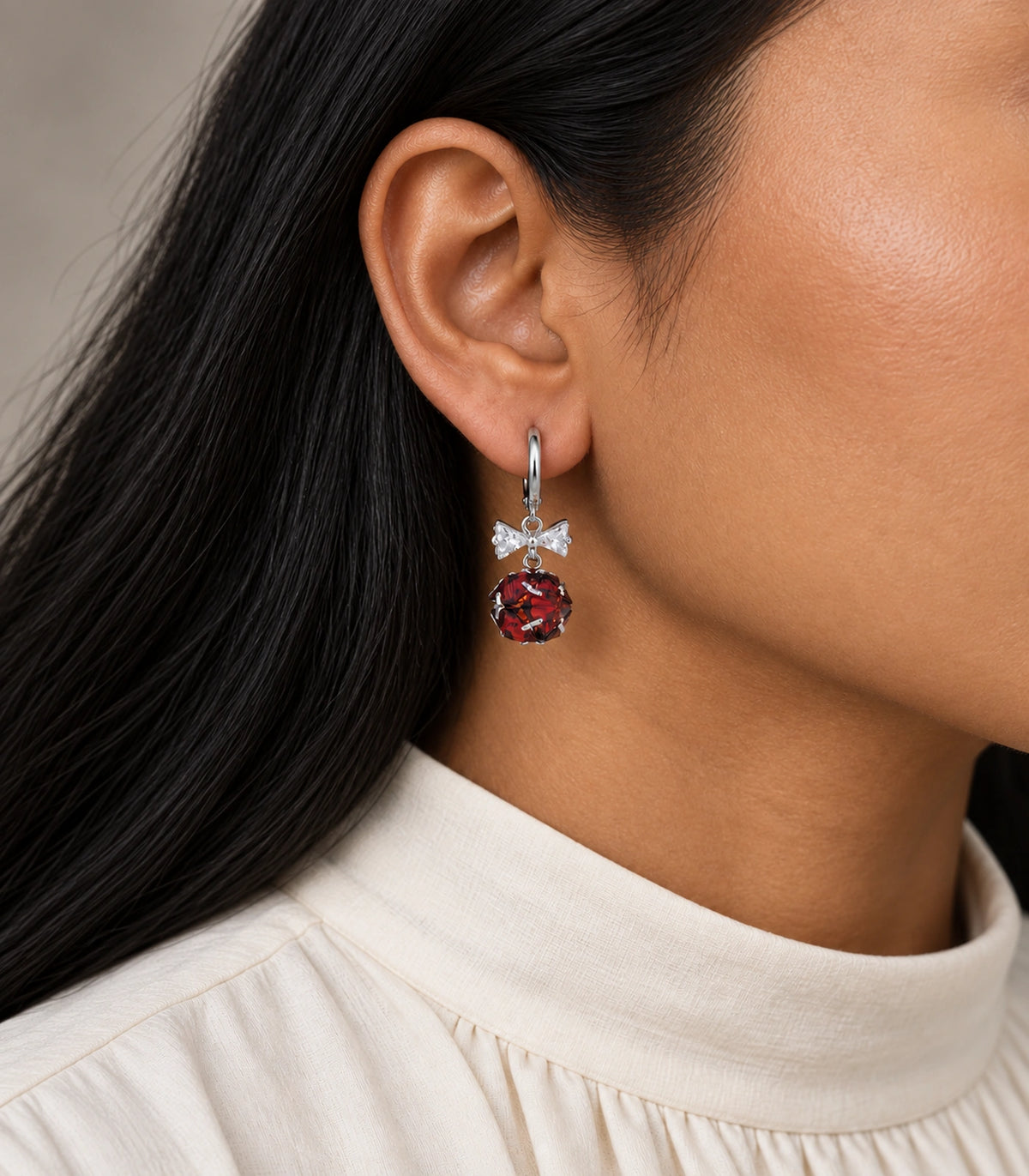 JIMIKI Silver Tone Red Crystal Ball Bow Drop Hoop Earring Pair in Silver-tone / Red, model wearing view