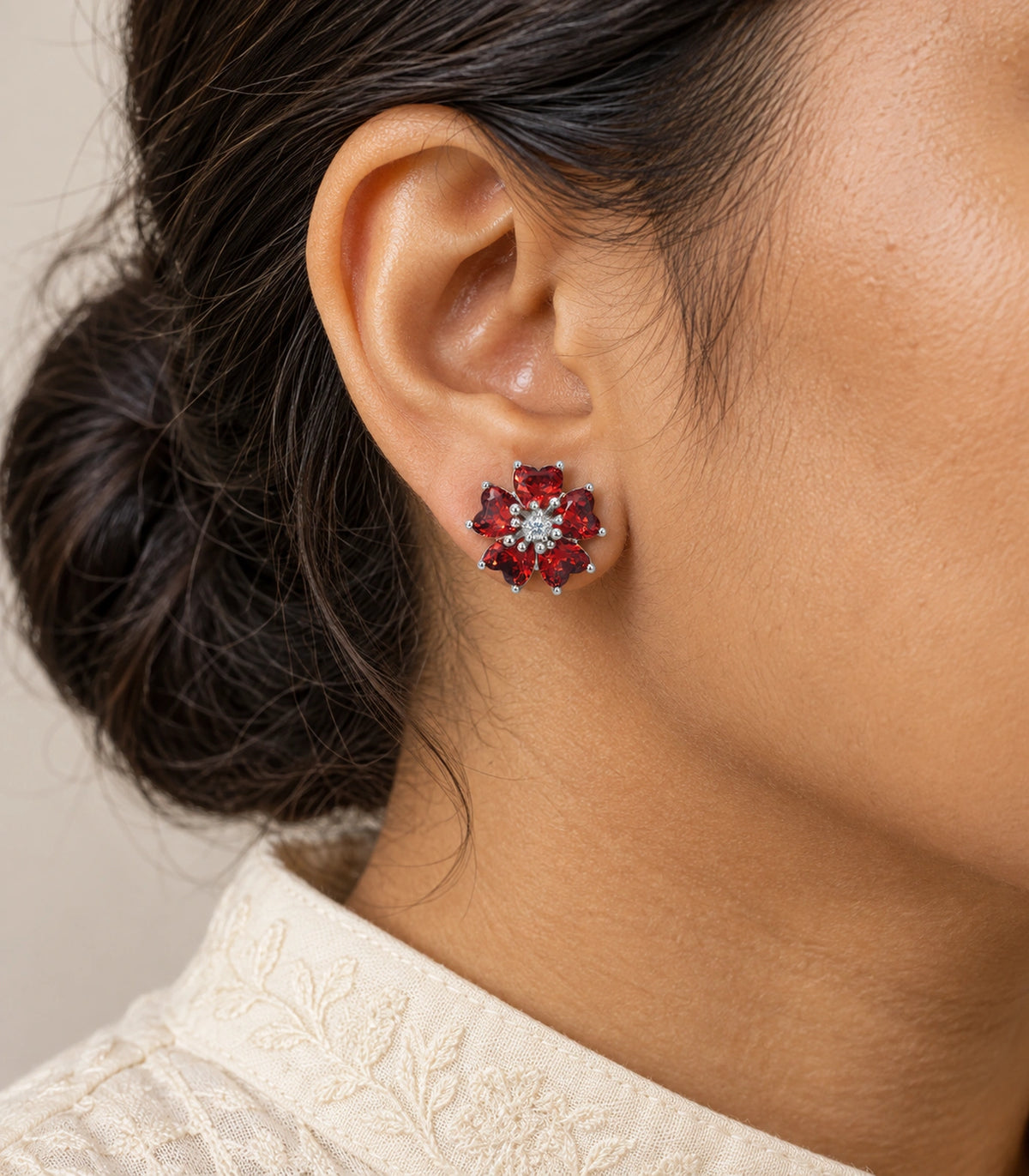 JIMIKI Five Petal Crystal Flower Stud Earring Pair in Silver tone / red, close-up detail #color_silver tone / red