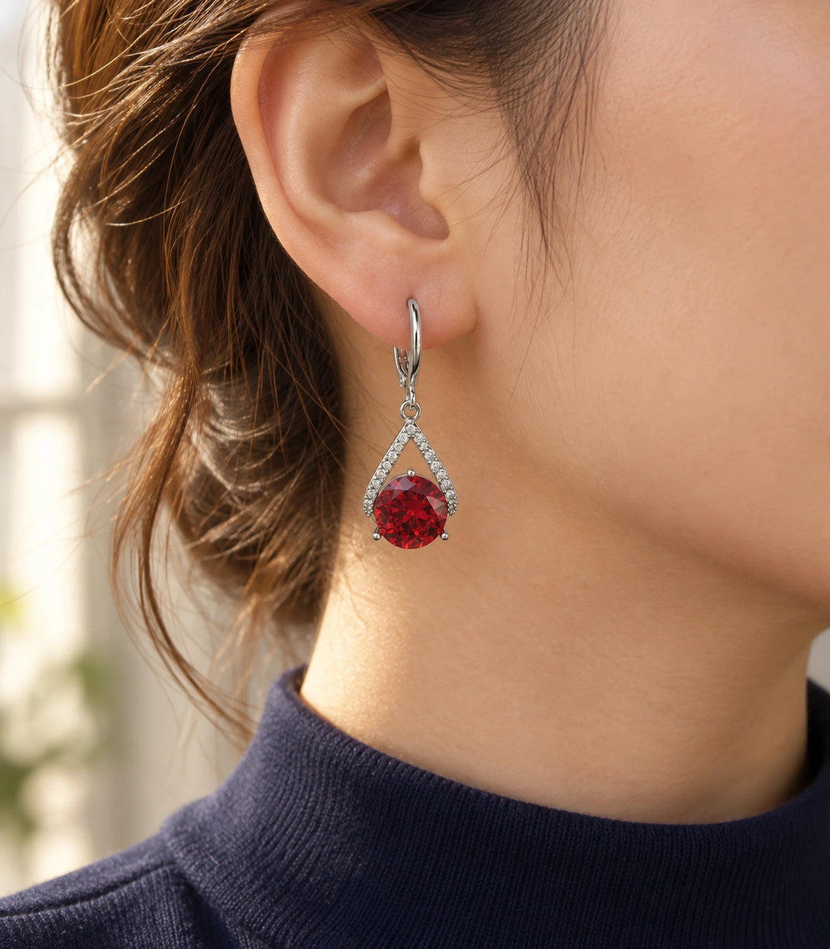 JIMIKI Round Crystal Teardrop Frame Drop Earring Pair in Silver tone/Red, editorial model view #color_silver tone/red