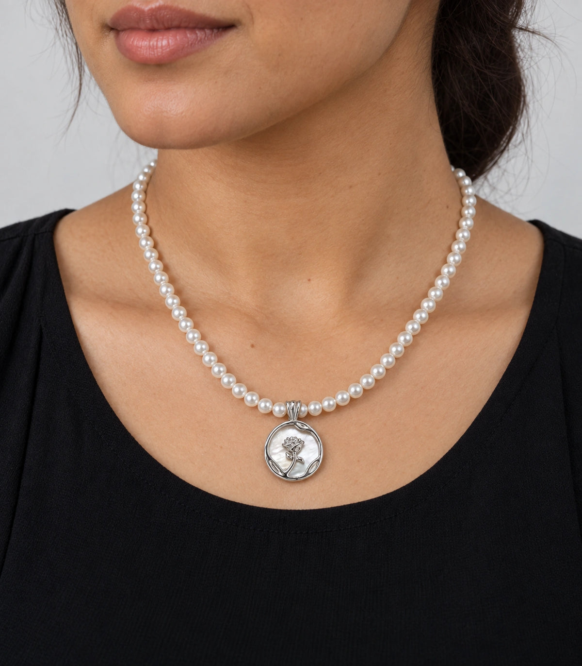 JIMIKI Silver Tone Rose Medallion Pearl Style Necklace in Silver tone / white, model wearing view
