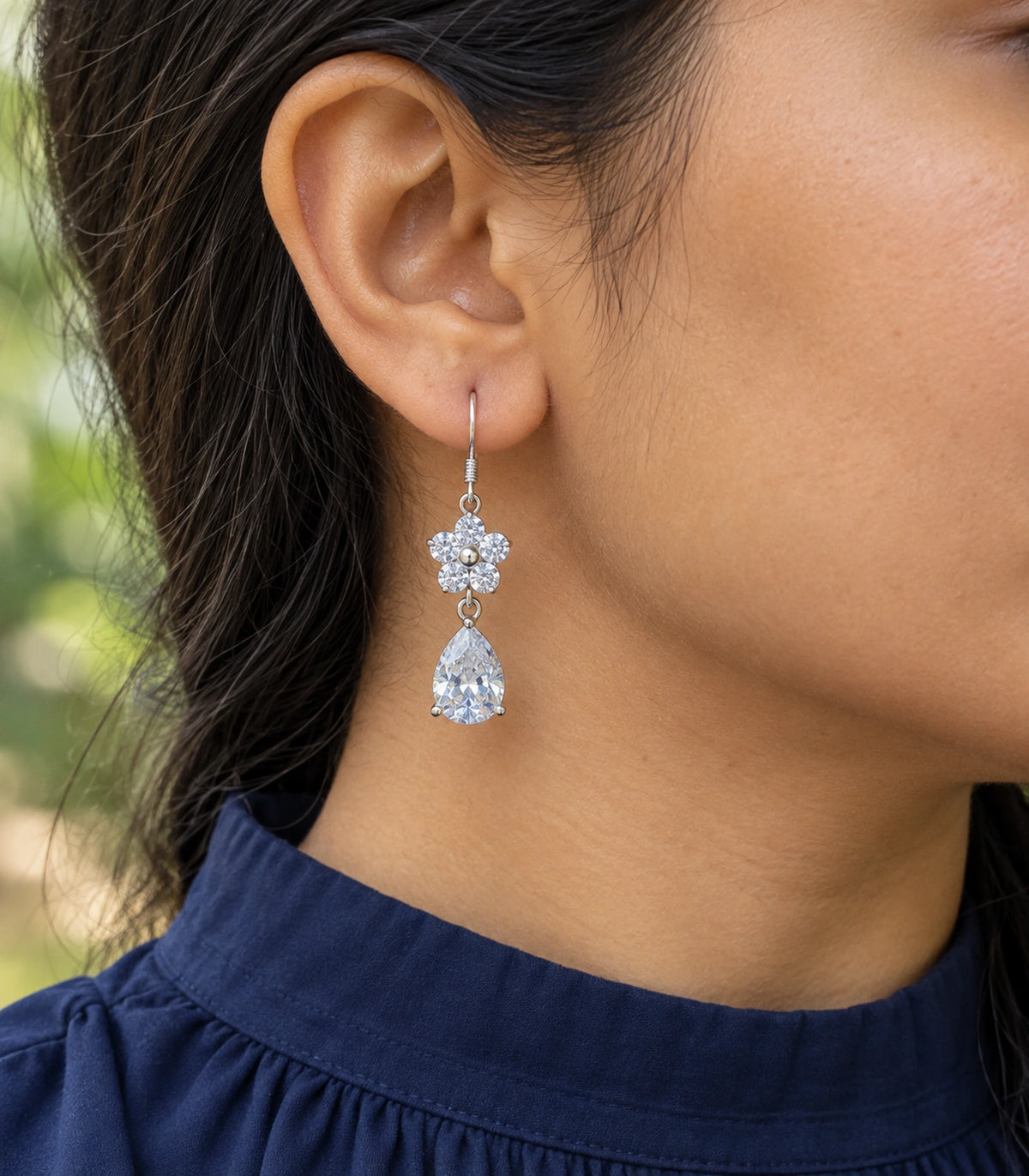 JIMIKI Silver-Tone Round Crystal Flower Pear Drop Earrings in Silver Tone, model wearing view