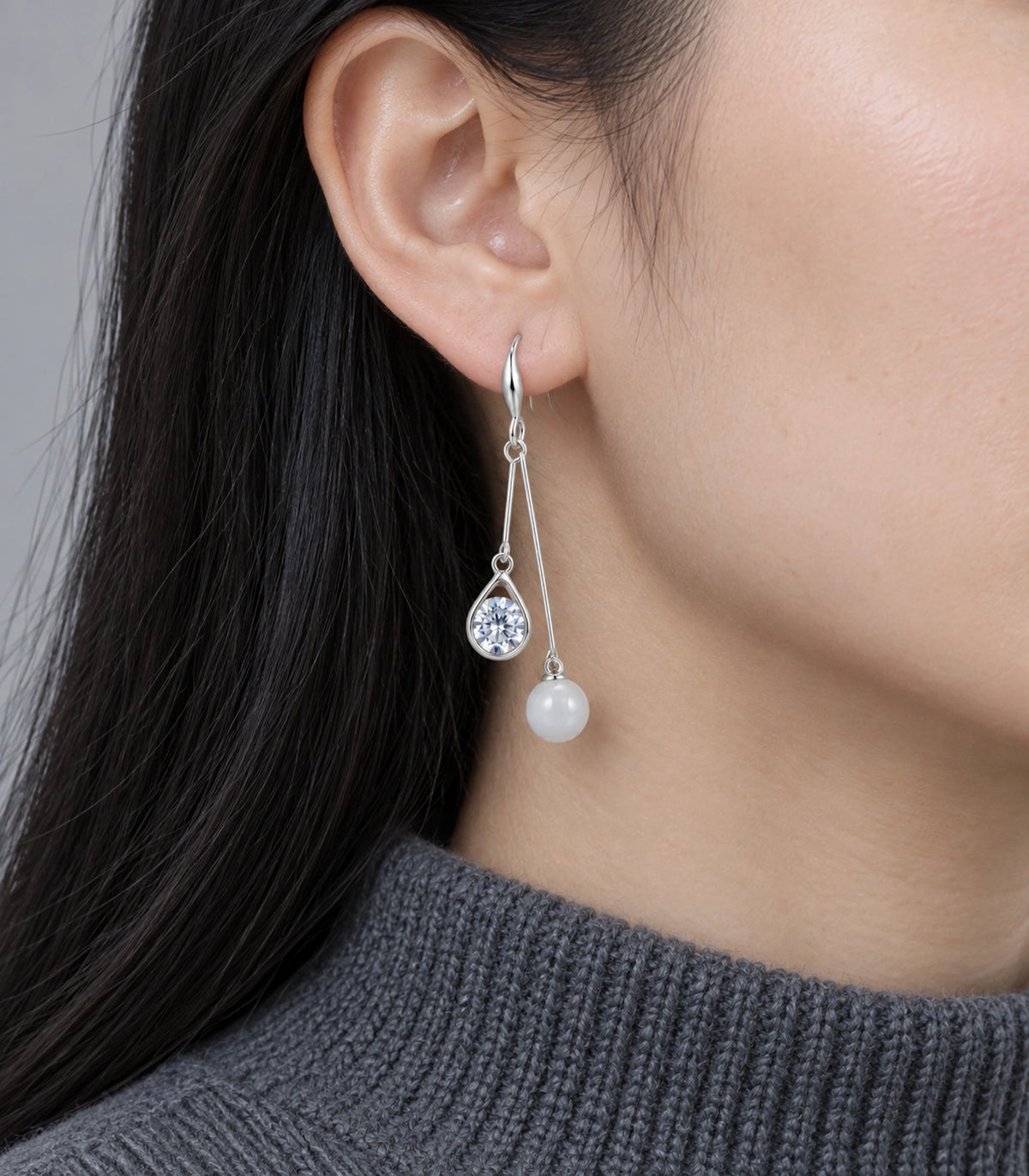 JIMIKI Silver-Tone Round Crystal Pearl Twin Wire Drop Earrings in Silver Tone, model wearing view
