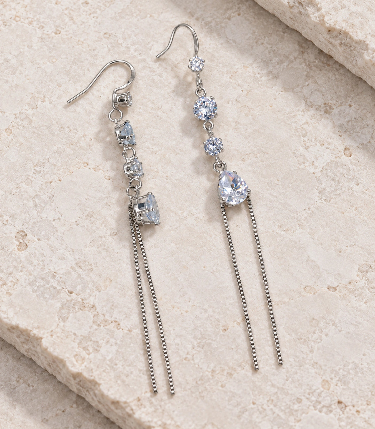 JIMIKI Silver Tone Round Pear Twin Chain Earring Pair in Silver-tone, editorial flat lay