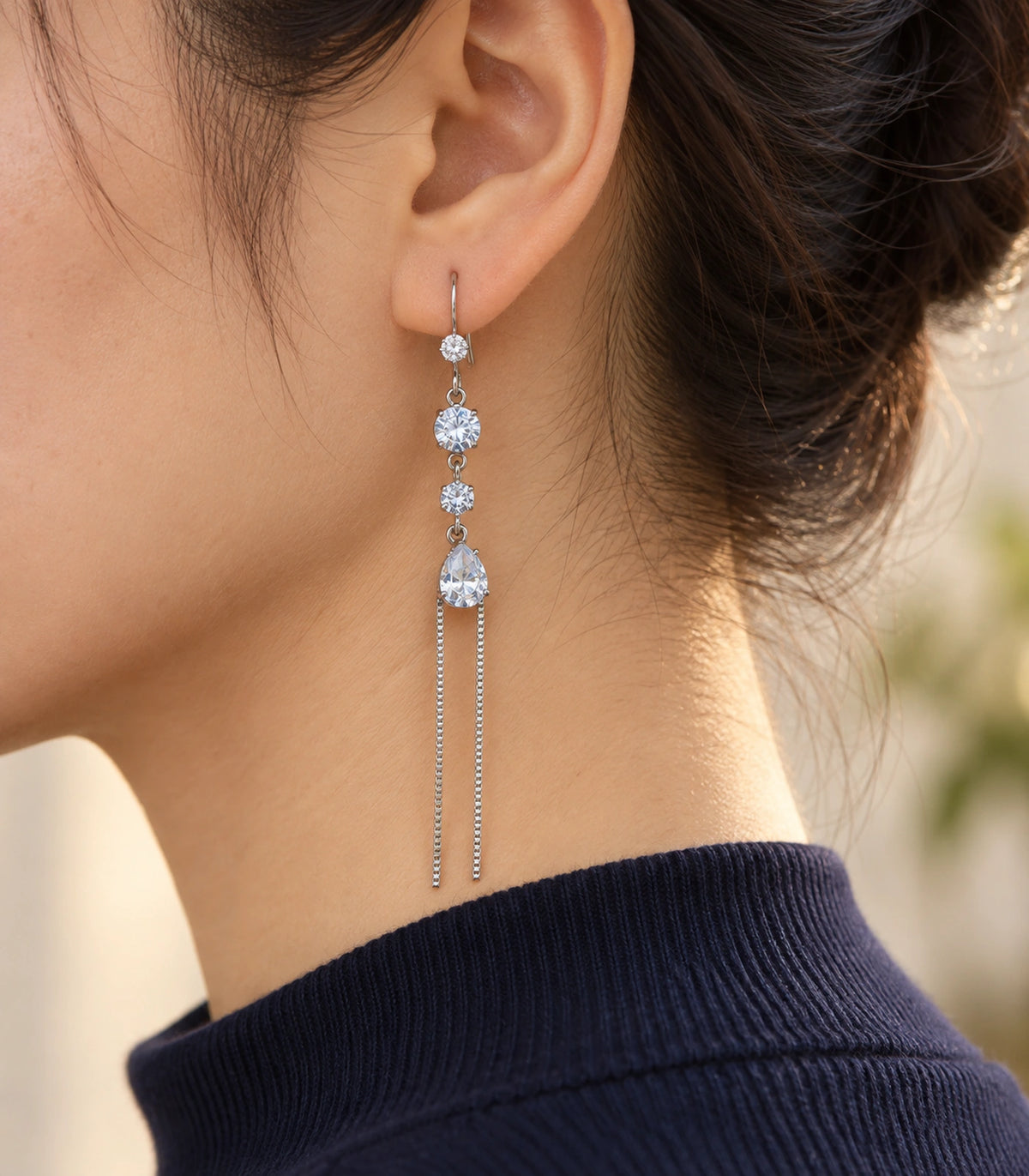 JIMIKI Silver Tone Round Pear Twin Chain Earring Pair in Silver-tone, editorial model view