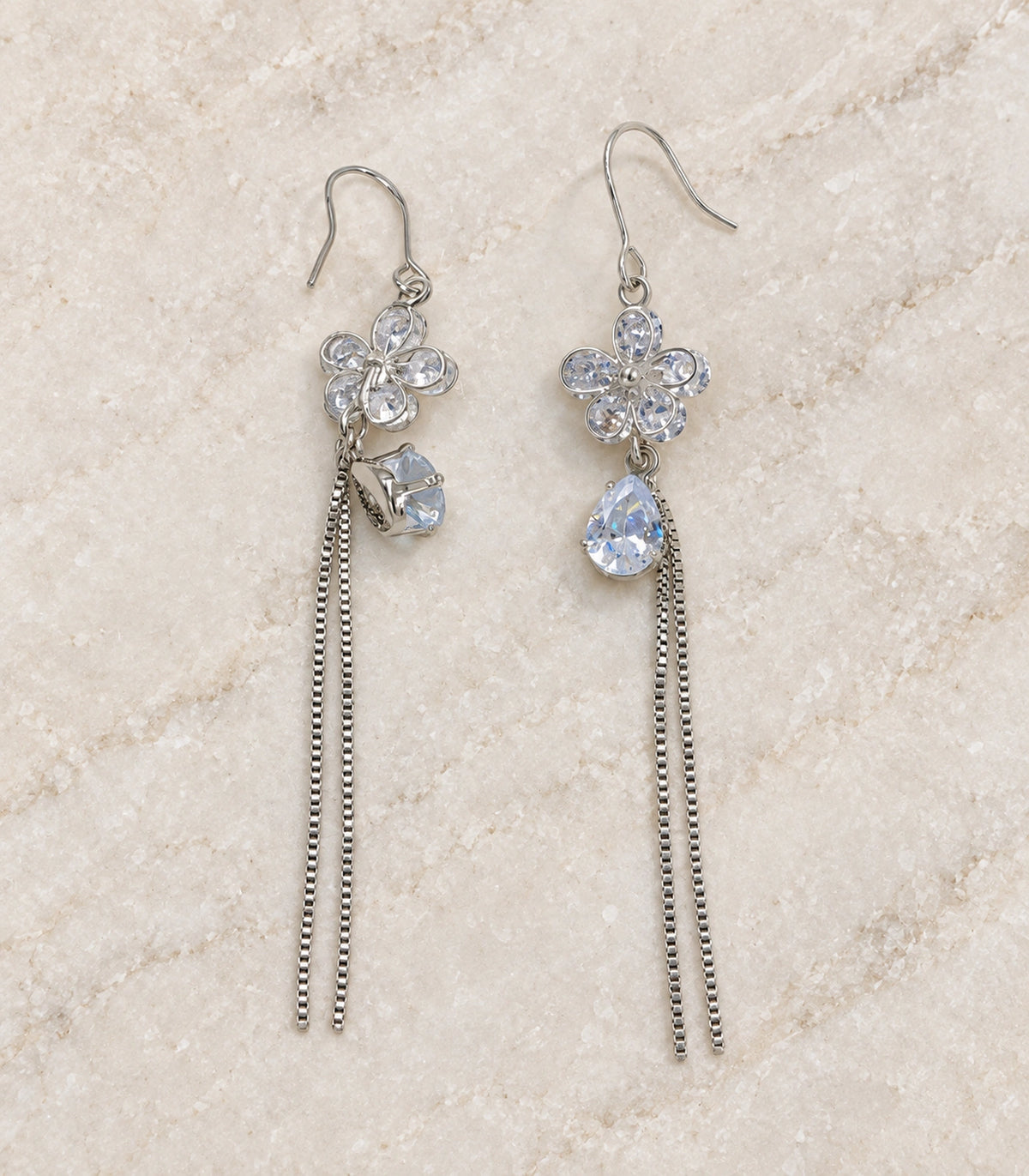 JIMIKI Silver Tone Rounded Flower Pear Twin Chain Earring Pair in Silver-tone, editorial flat lay