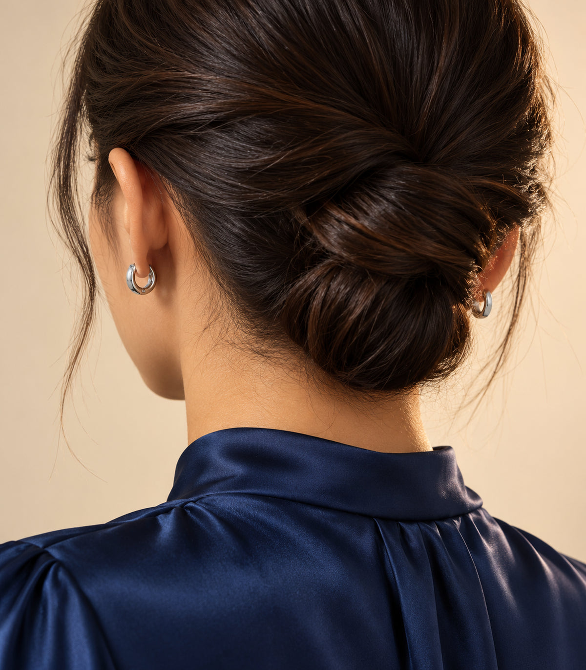 Silver Tone Smooth Huggie Hoop Earrings — editorial worn view
