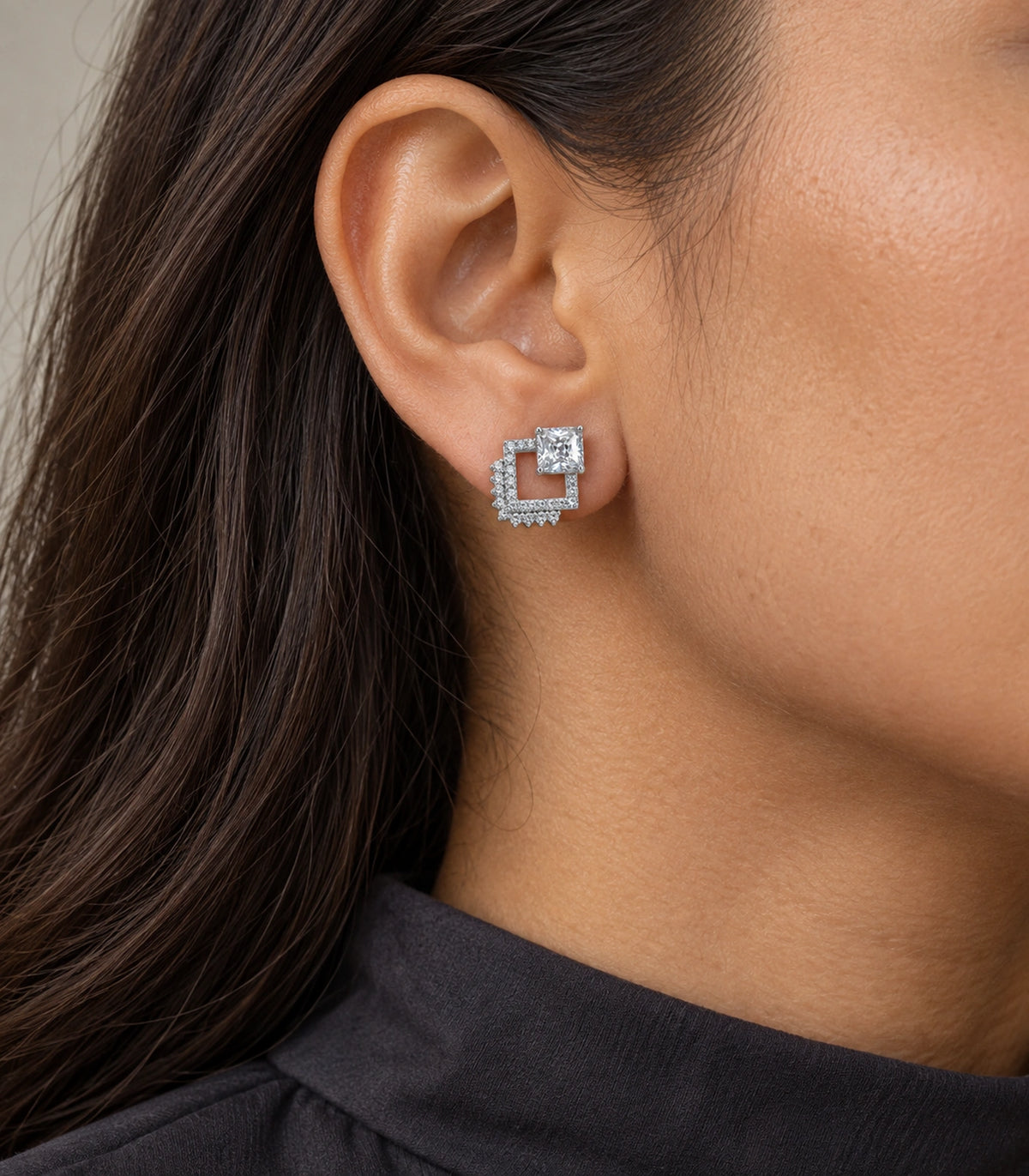 JIMIKI Silver Tone Square Crystal Open Square Stud Earring Pair in Silver tone / clear, close-up detail
