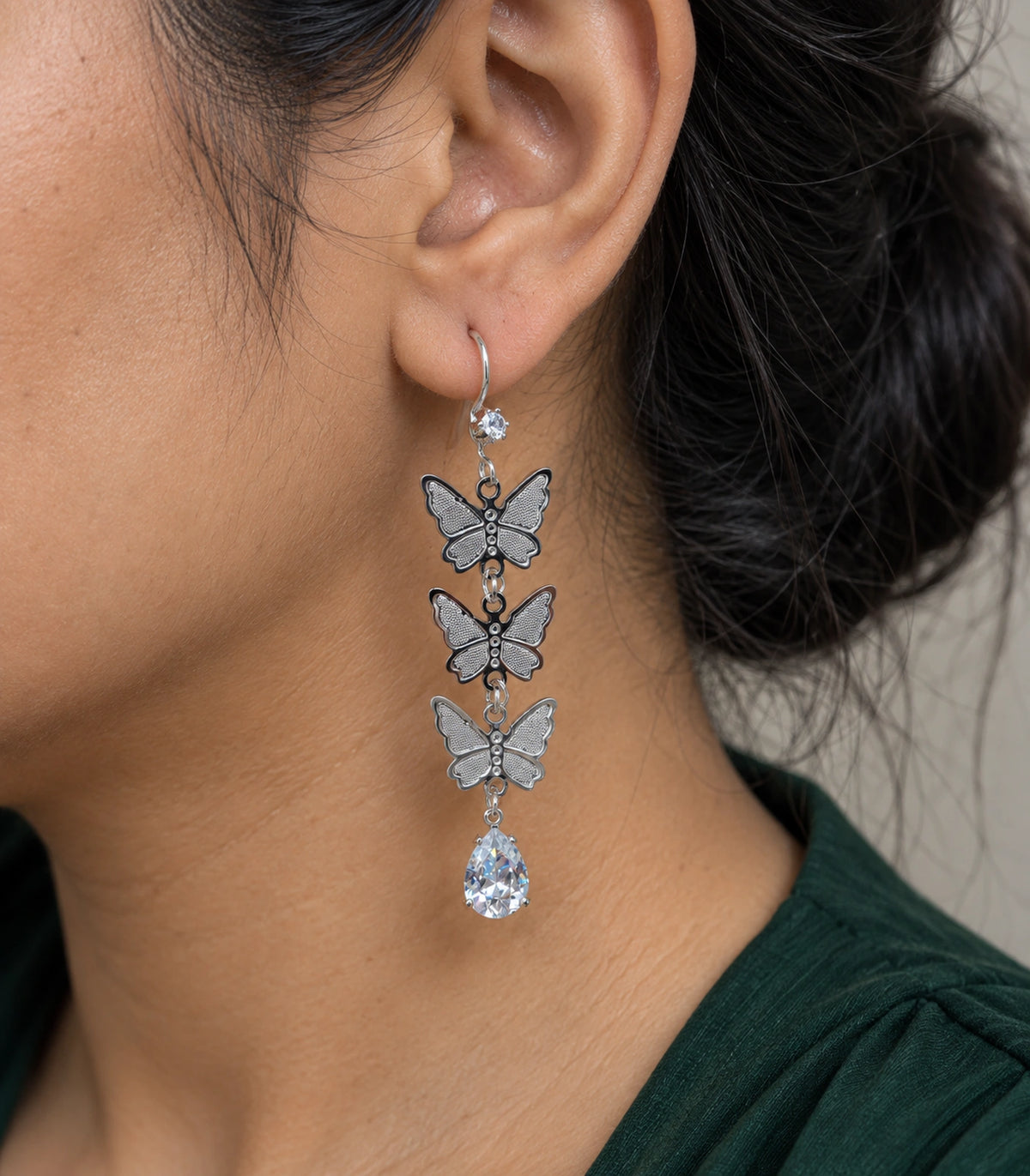 JIMIKI Silver Tone Three Butterfly Pear Drop Earring Pair in Silver-tone, close-up detail