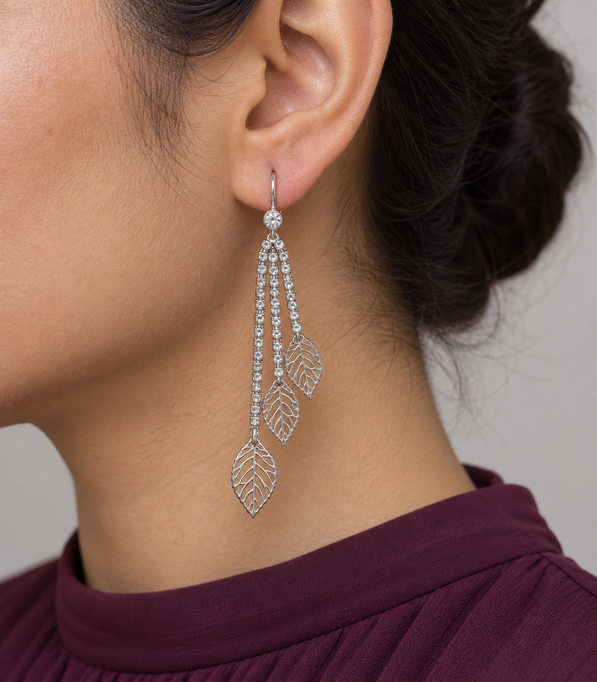 JIMIKI Silver Tone Three Leaf Crystal Tassel Earring Pair in Silver-tone, close-up detail