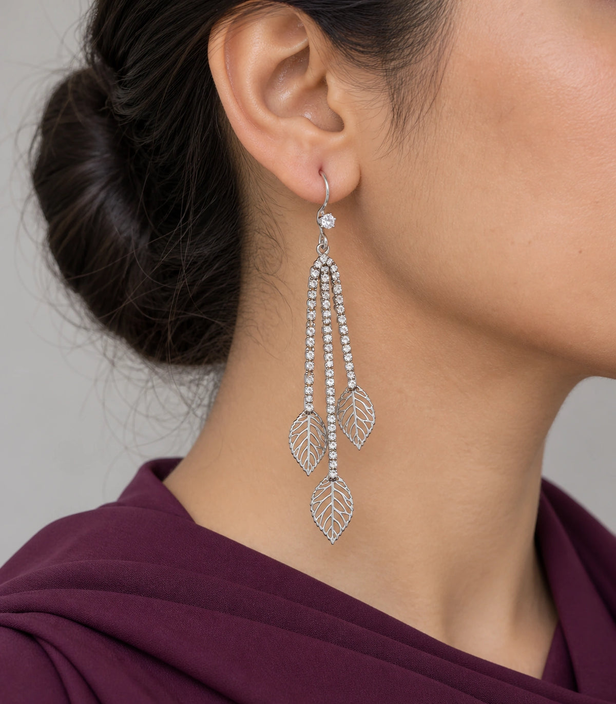 JIMIKI Silver Tone Three Leaf Crystal Tassel Earring Pair in Silver-tone, model wearing view