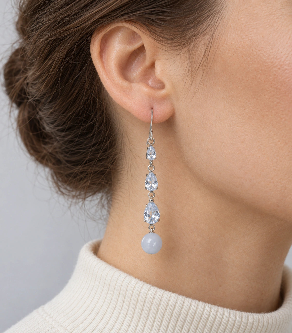 JIMIKI Silver Tone Three Pear White Bead Drop Earring Pair in Silver-tone, model wearing view