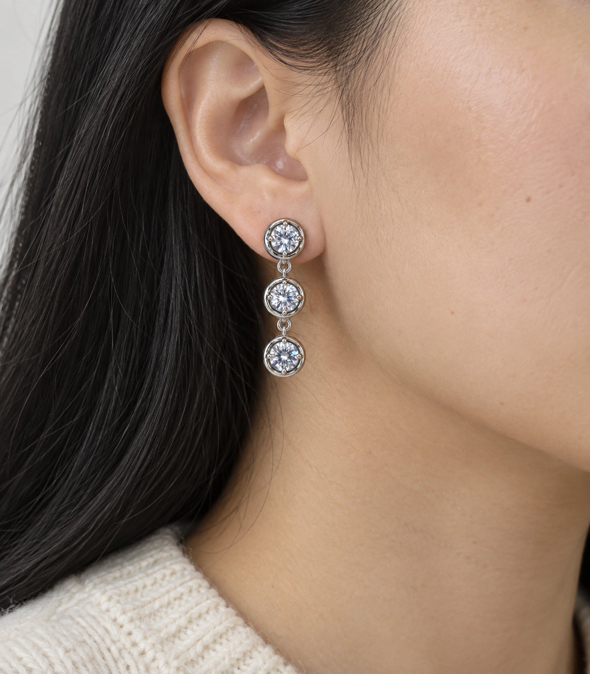 JIMIKI Three Round Crystal Drop Earring Pair in Silver tone/Clear, model wearing view #color_silver tone/clear