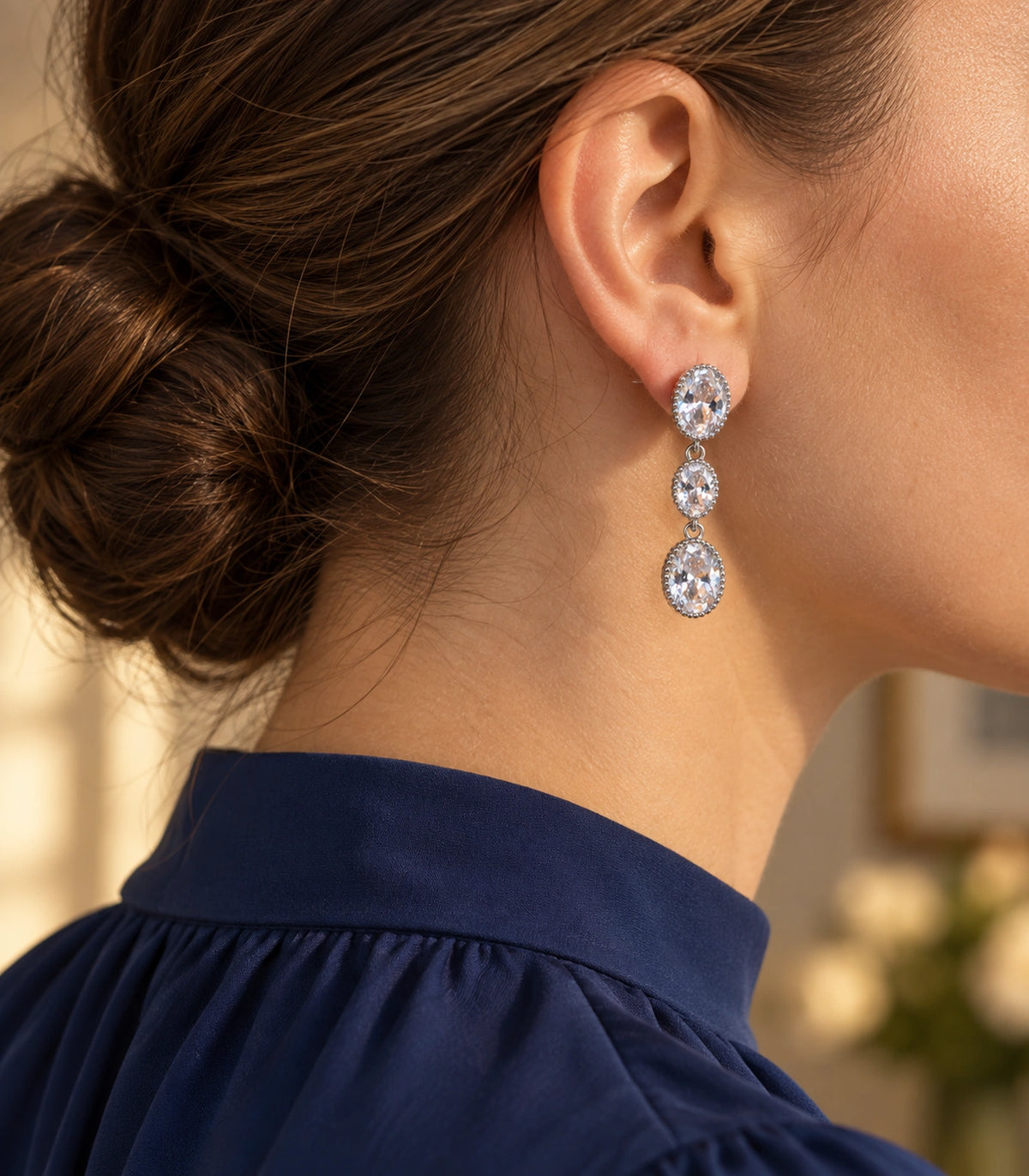 JIMIKI Triple Oval Crystal Drop Earrings in Silver tone, editorial model view #color_silver tone