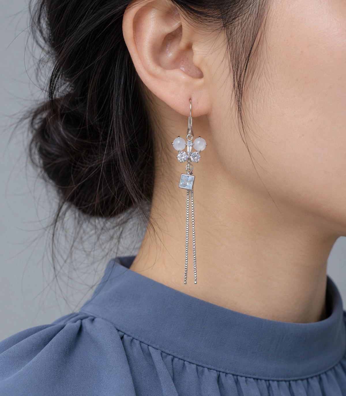 JIMIKI Silver Tone White Butterfly Square Chain Tassel Earring Pair in Silver-tone, model wearing view
