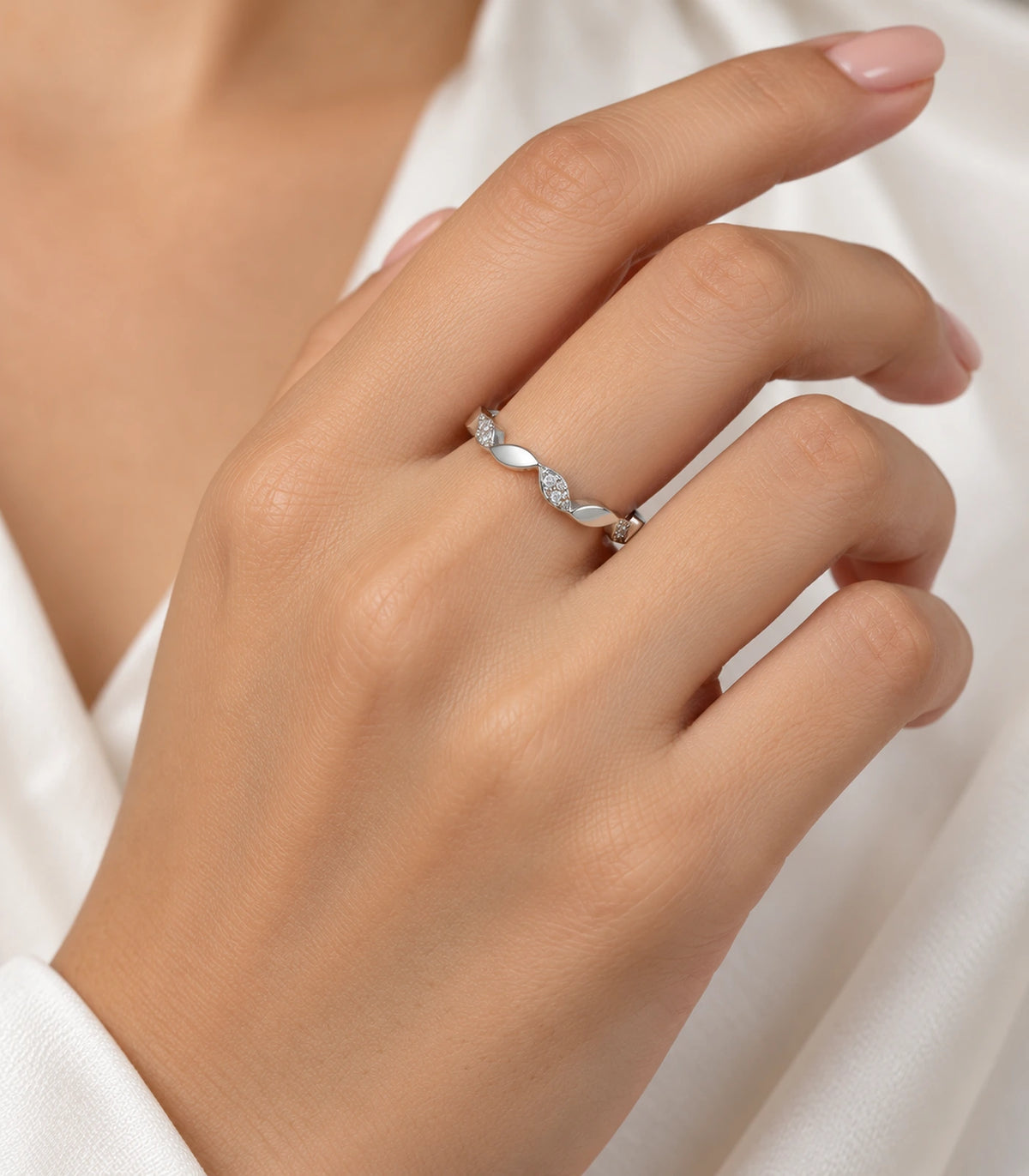 JIMIKI Twisted Leaf Crystal Adjustable Ring in Silver - worn styling view #color_silver