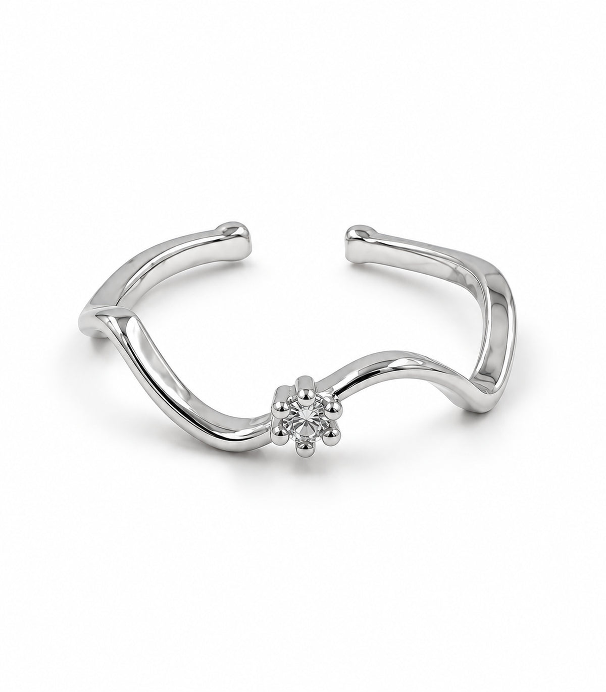 Silver-tone wave open ring with one round clear stone, shown on a white background