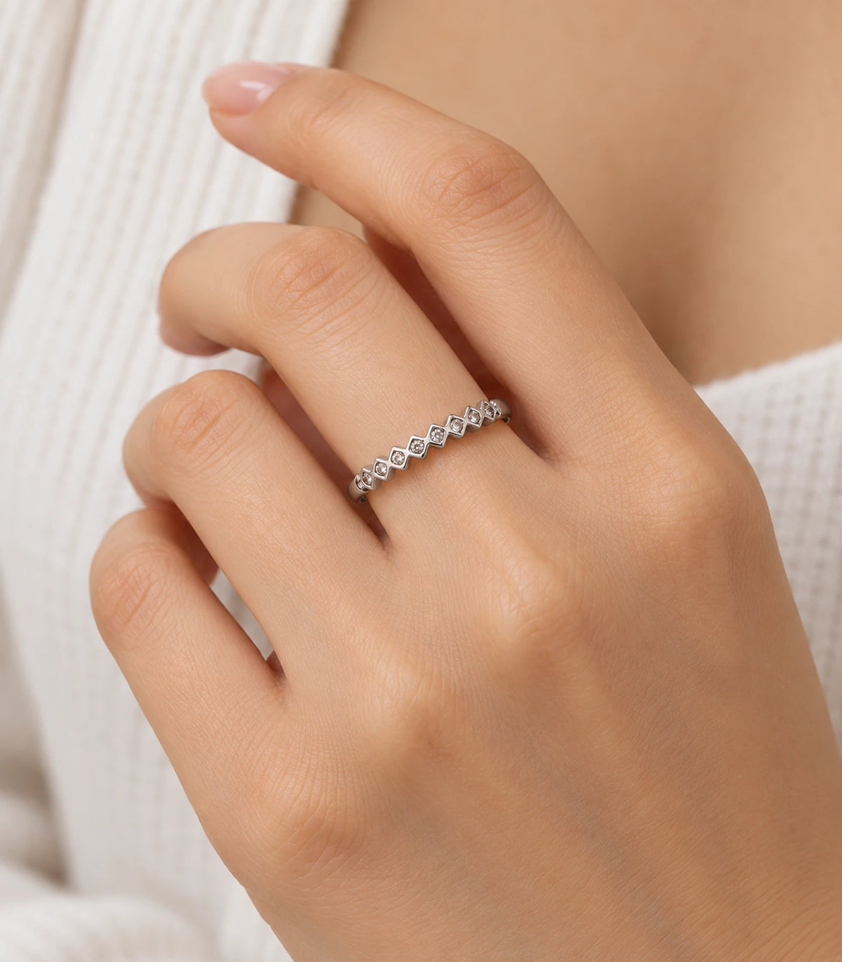 JIMIKI Silver Zigzag Crystal Band Ring in Silver - worn styling view #color_silver