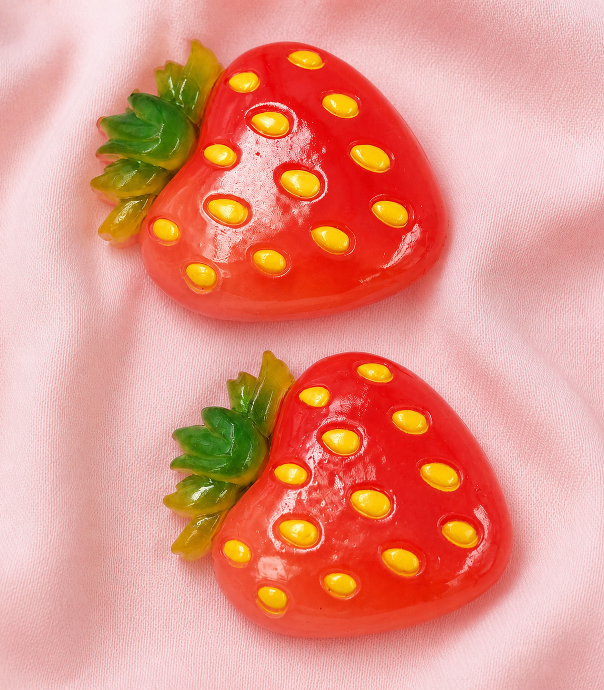 Strawberry Barrette Pair editorial flat lay