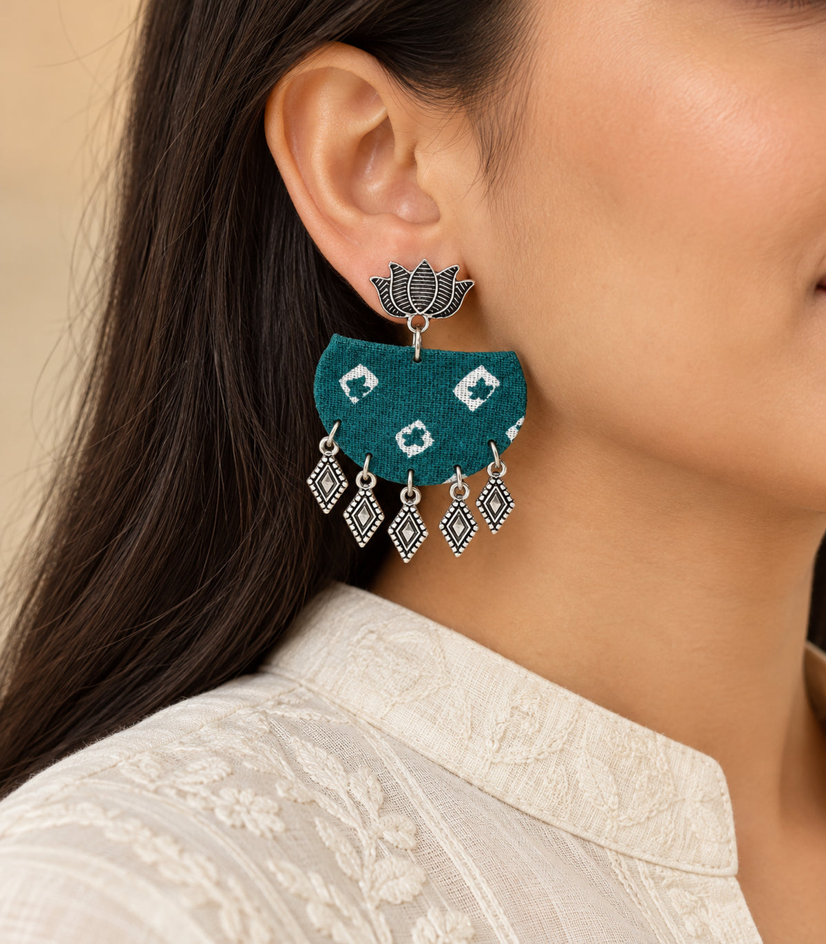 Teal fabric lotus diamond charm earrings - model view