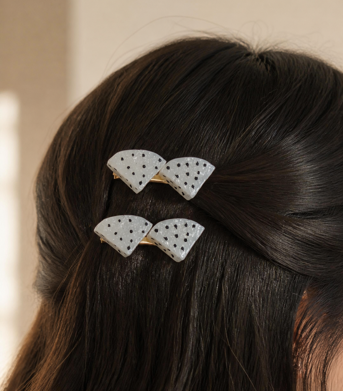 White Dragonfruit Double Wedge Clip Pair in a styled editorial view