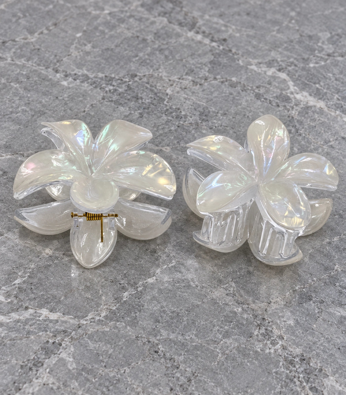JIMIKI Iridescent Five Petal Flower Hair Claw Clips in White, editorial flat lay #color_white
