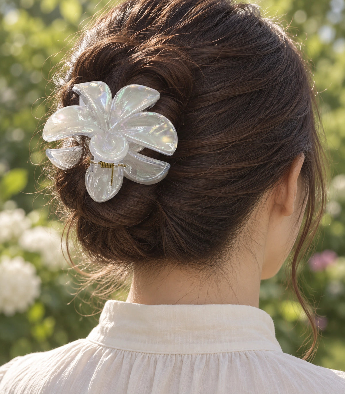 JIMIKI Iridescent Five Petal Flower Hair Claw Clips in White, editorial model view #color_white