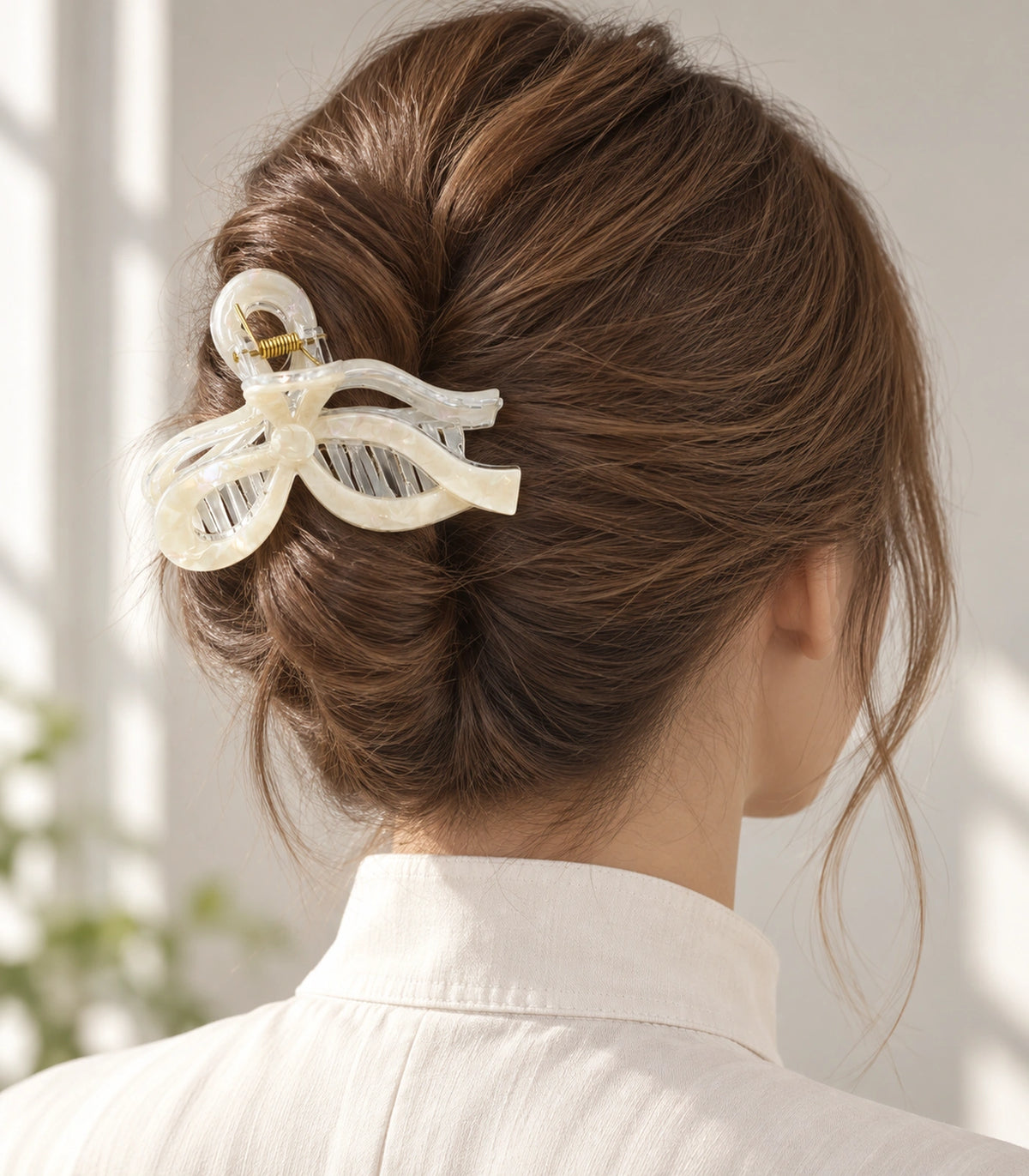 JIMIKI Iridescent Openwork Bow Hair Claw Clips in White, editorial model view #color_white