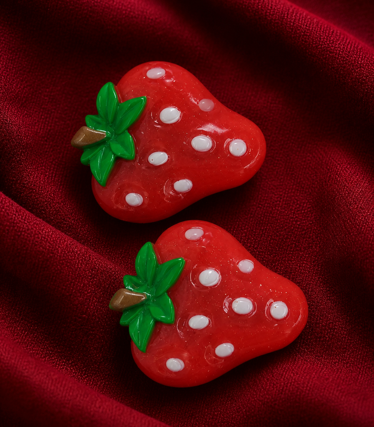 White Seed Strawberry Barrette Pair close-up view