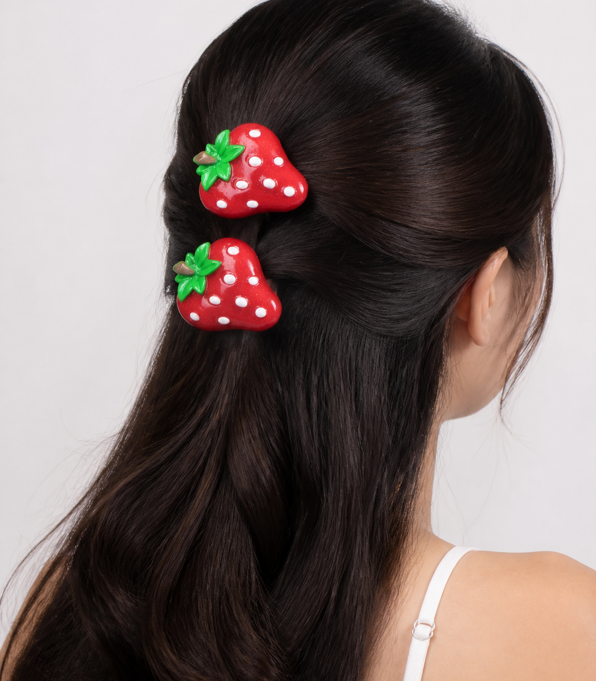White Seed Strawberry Barrette Pair styled editorial view
