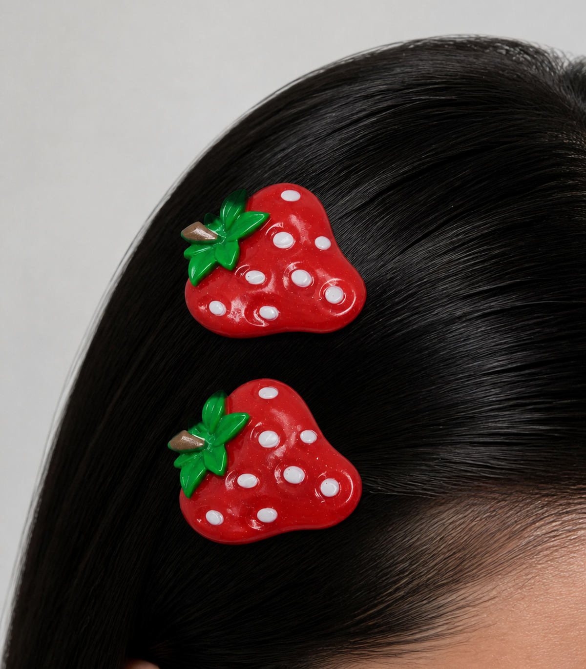 White Seed Strawberry Barrette Pair worn in hair