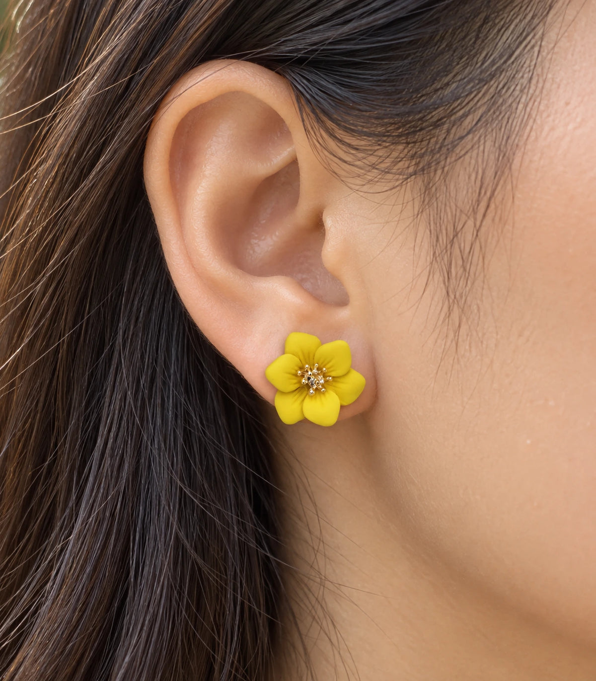 JIMIKI Yellow compact six petal flower stud earrings, close-up of six rounded petals and gold-tone centre #color_yellow