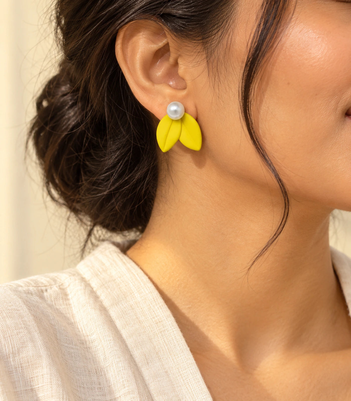 JIMIKI Double Leaf Pearl Stud Earrings in Yellow — earrings styled with an outfit #color_yellow