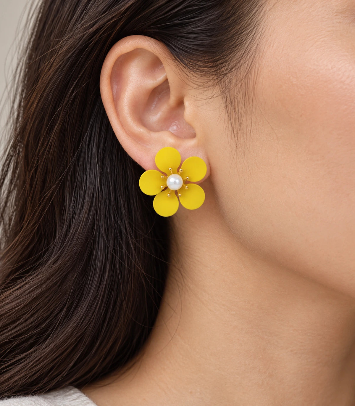 JIMIKI yellow five-petal flower stud earrings with pearl-effect centre, flower stud worn on the earlobe #color_yellow