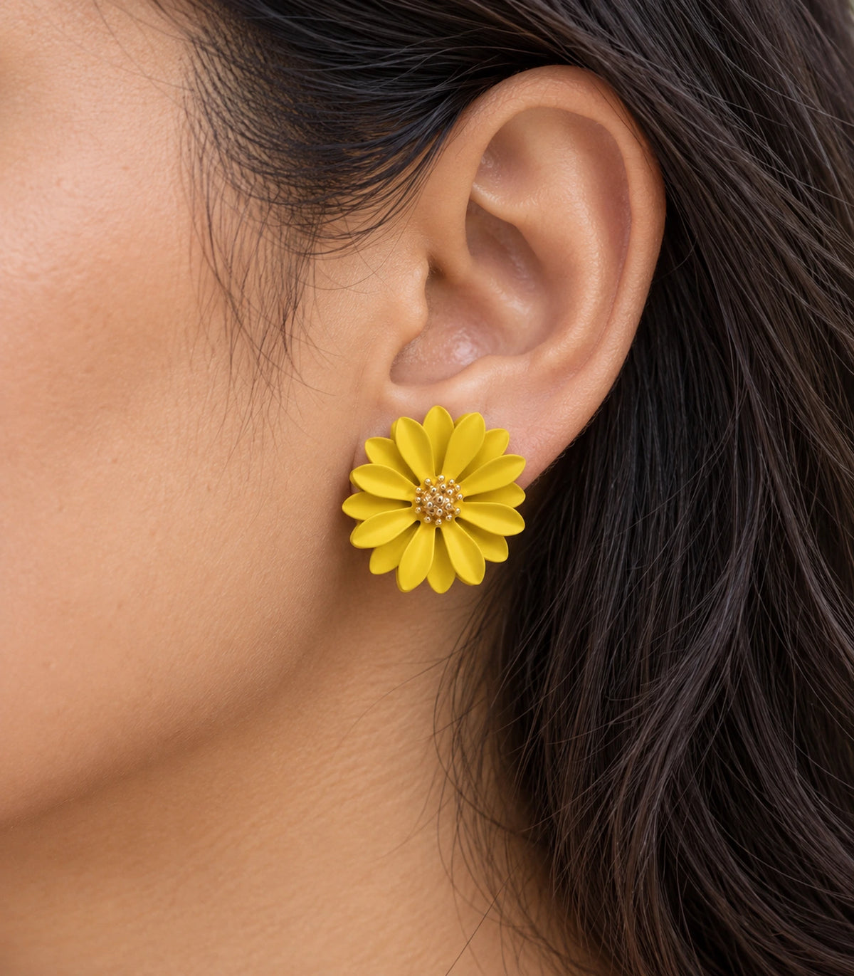 JIMIKI Yellow layered starburst daisy stud earrings, close-up of layered petals and gold-tone centre #color_yellow