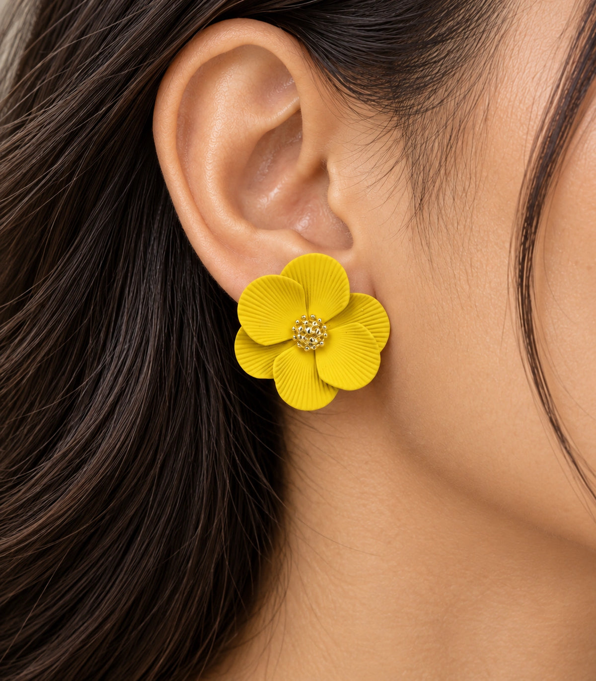 JIMIKI Yellow ribbed flower stud earrings, worn closeup of ribbed petals and gold-tone centre #color_yellow